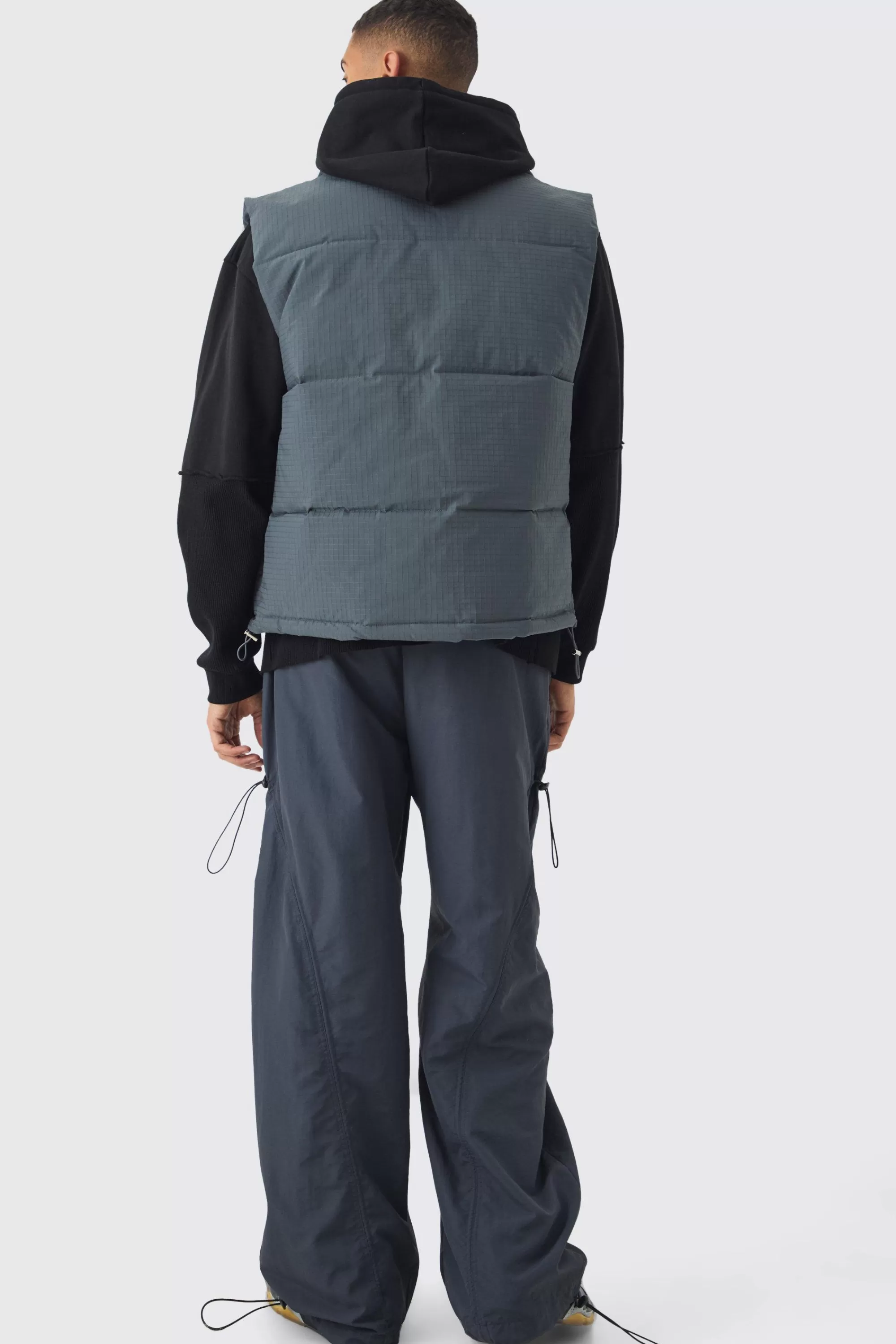 boohooMAN Man Tab Ripstop Funnel Neck Puffer Gilet In | UK