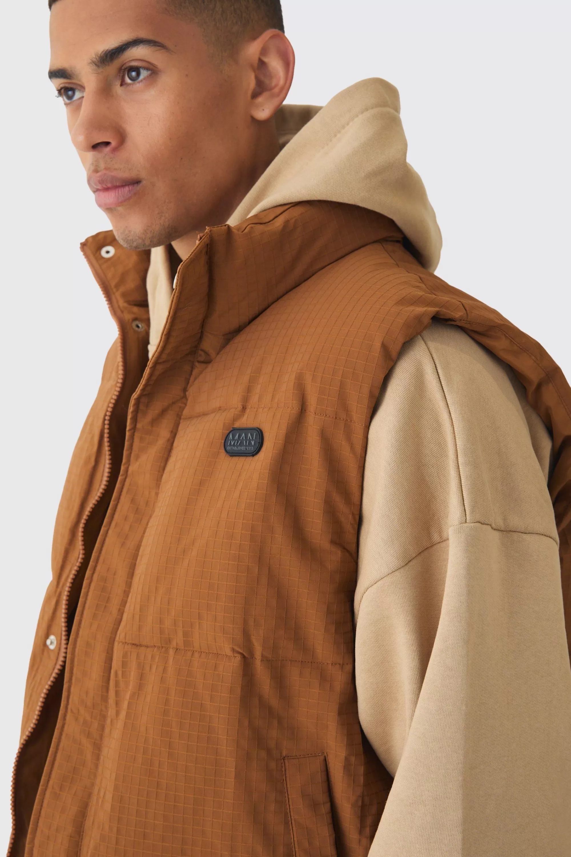 boohooMAN Man Tab Ripstop Funnel Neck Puffer Gilet In | UK