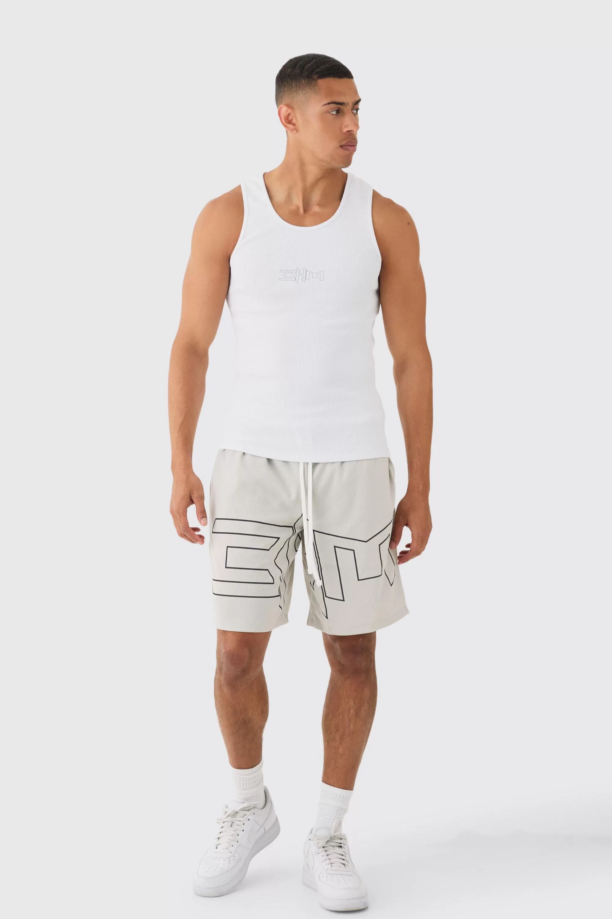 boohooMAN Muscle Fit Ribbed Vest & Mesh Basketball Shorts Set | UK