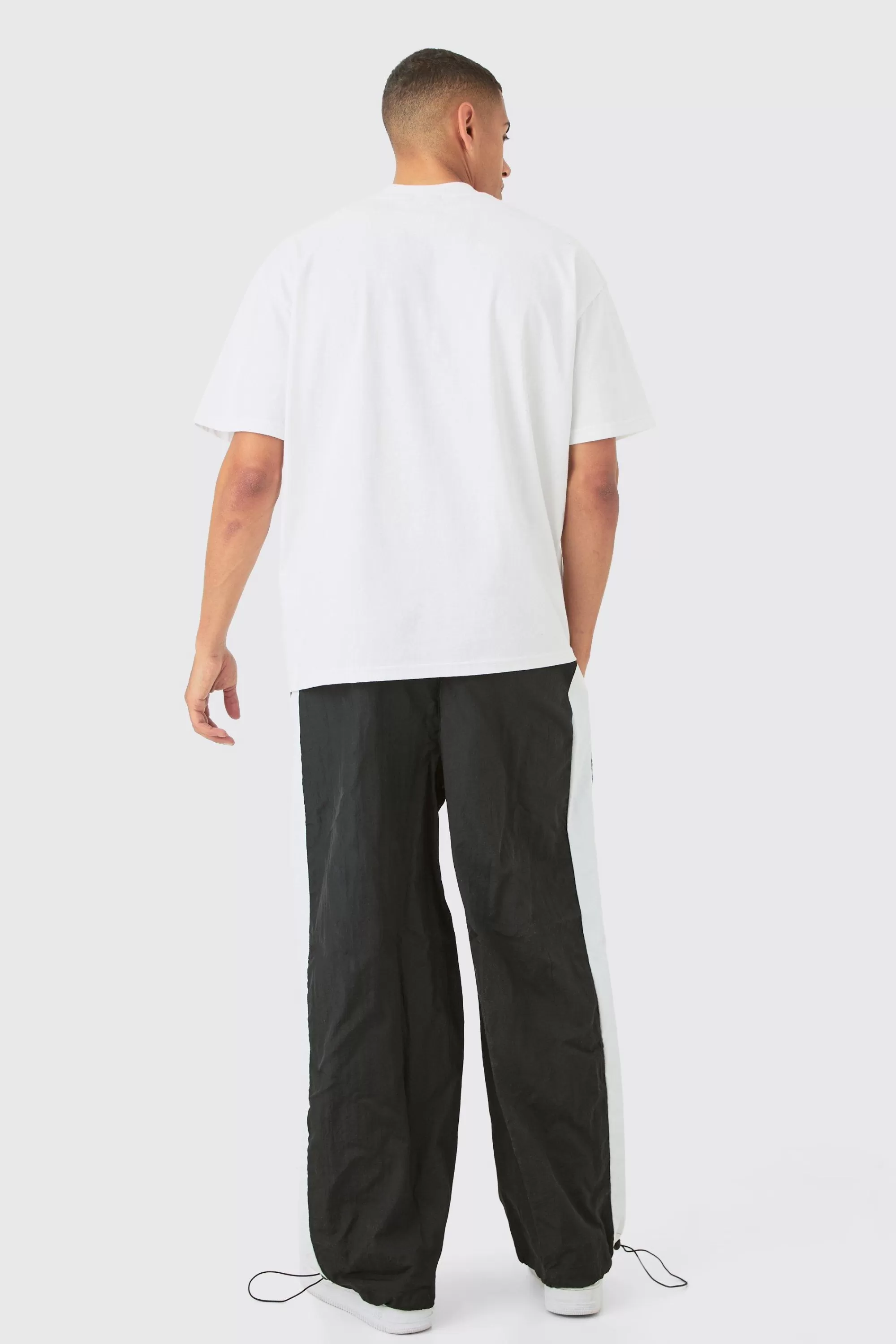 boohooMAN OFCL Side Panel Parachute Pants | UK