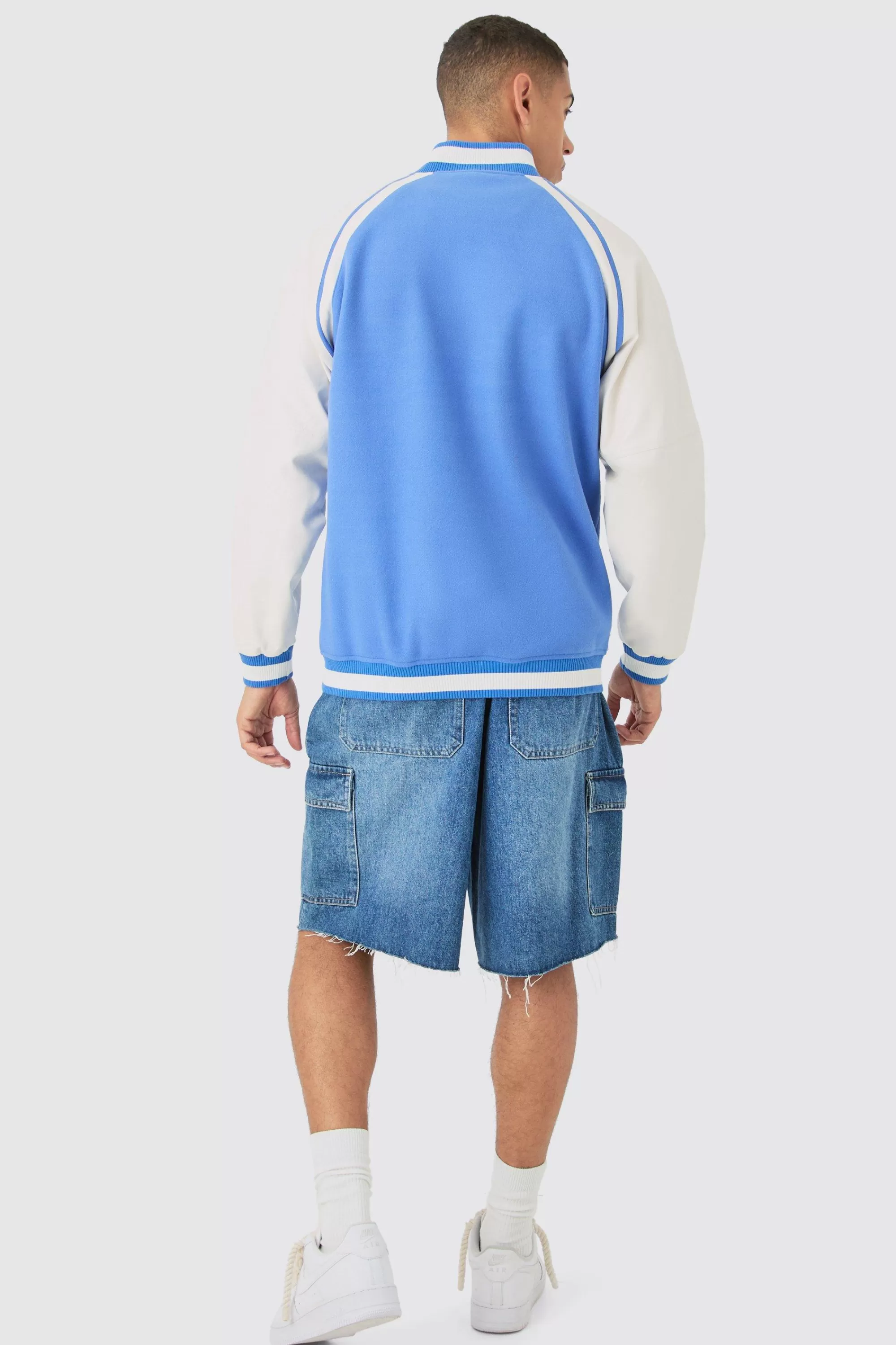 boohooMAN Official Badge Raglan PU Sleeve Varsity Jacket In | UK