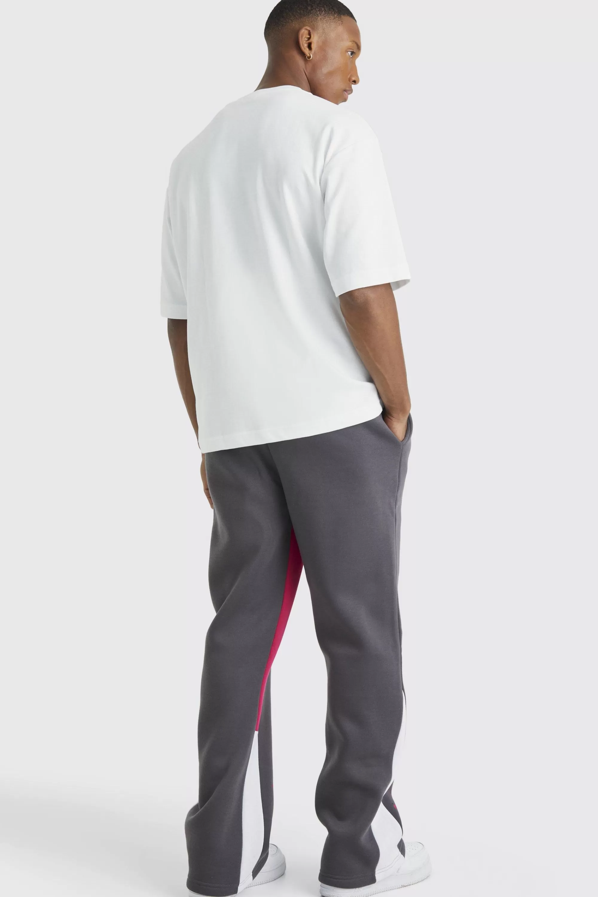 boohooMAN Official Graffiti Paint Splatter Gusset Joggers | UK