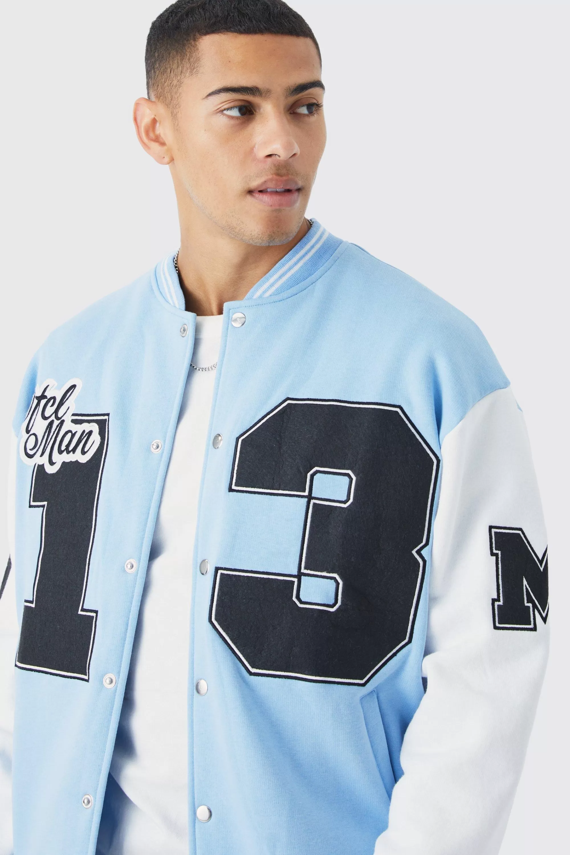 boohooMAN Oversized Badge Jersey Varsity Bomber Jacket | UK