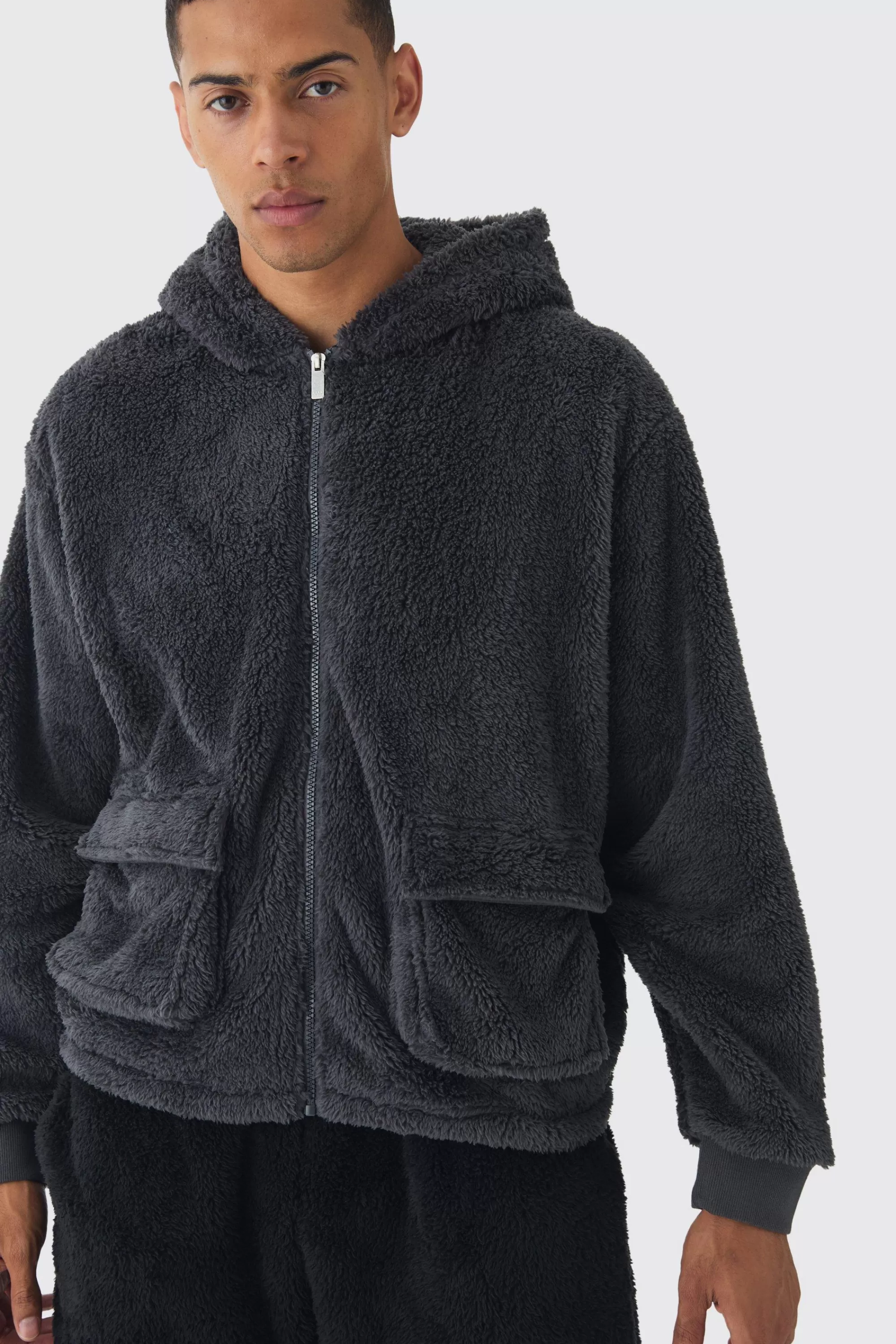boohooMAN Oversized Boxy Cargo Pocket Zip Through Teddy Borg Hoodie | UK