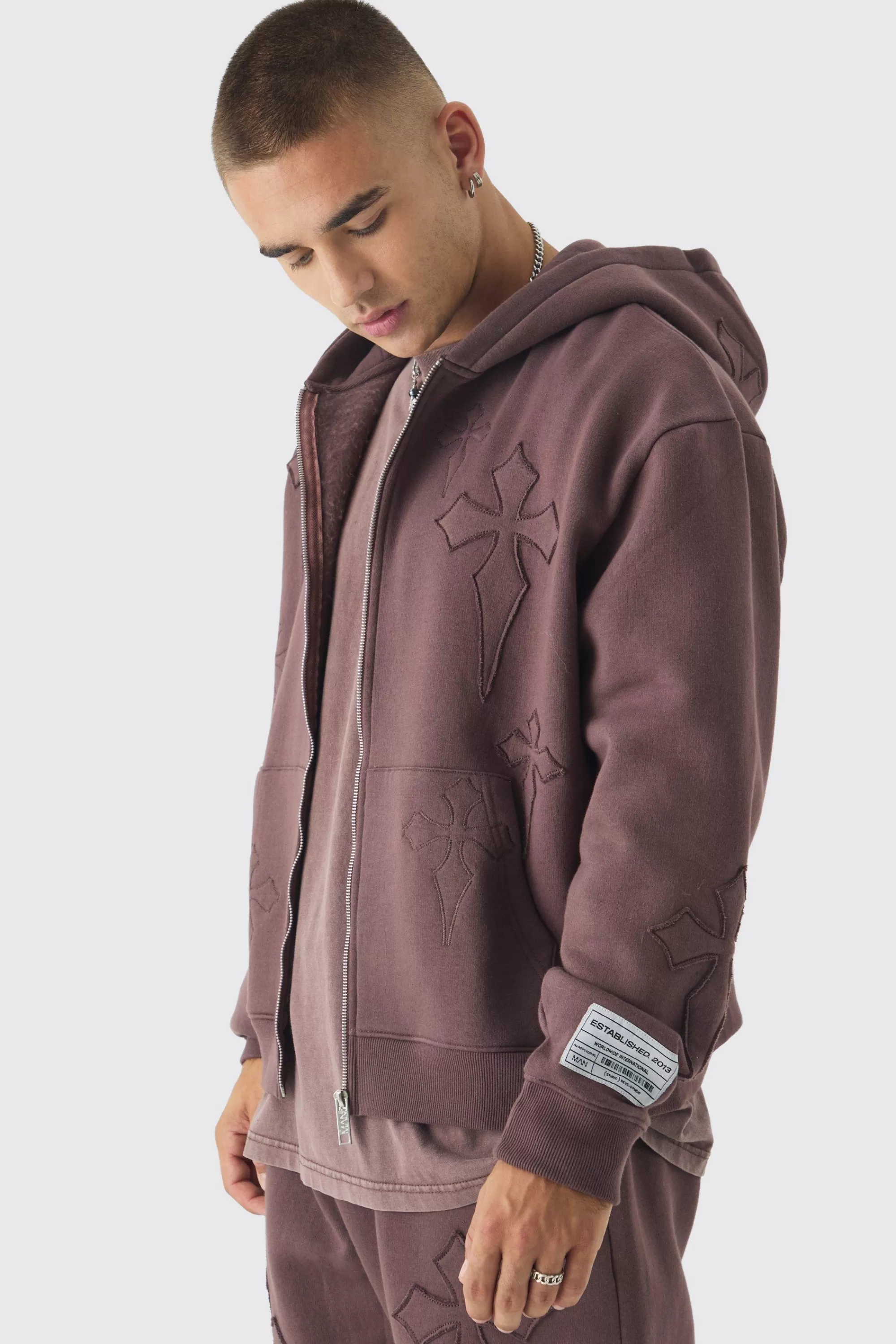 boohooMAN Oversized Boxy Cross Applique Zip Through Hoodie And Relaxed Jogger Tracksuit | UK