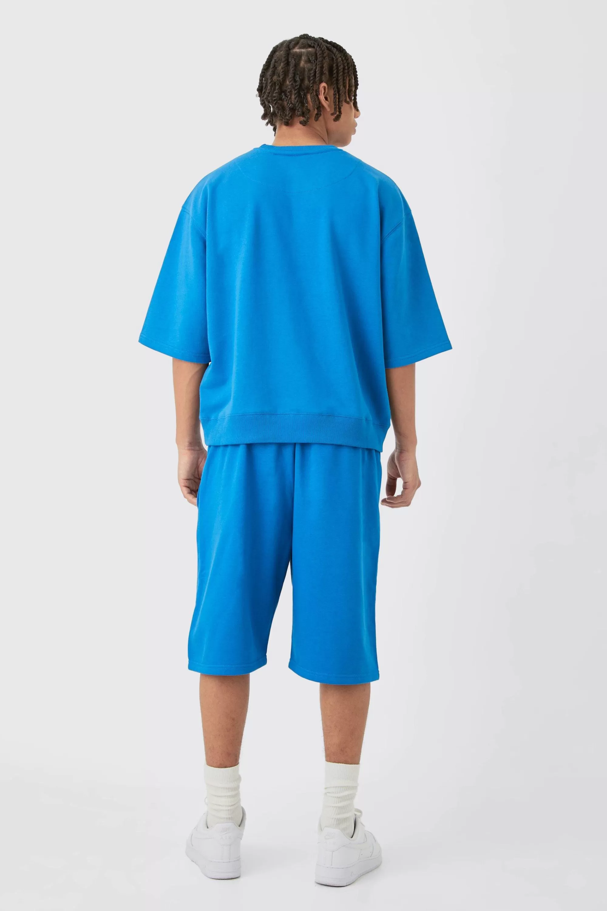 boohooMAN Oversized Boxy Half Sleeve Short Tracksuit | UK