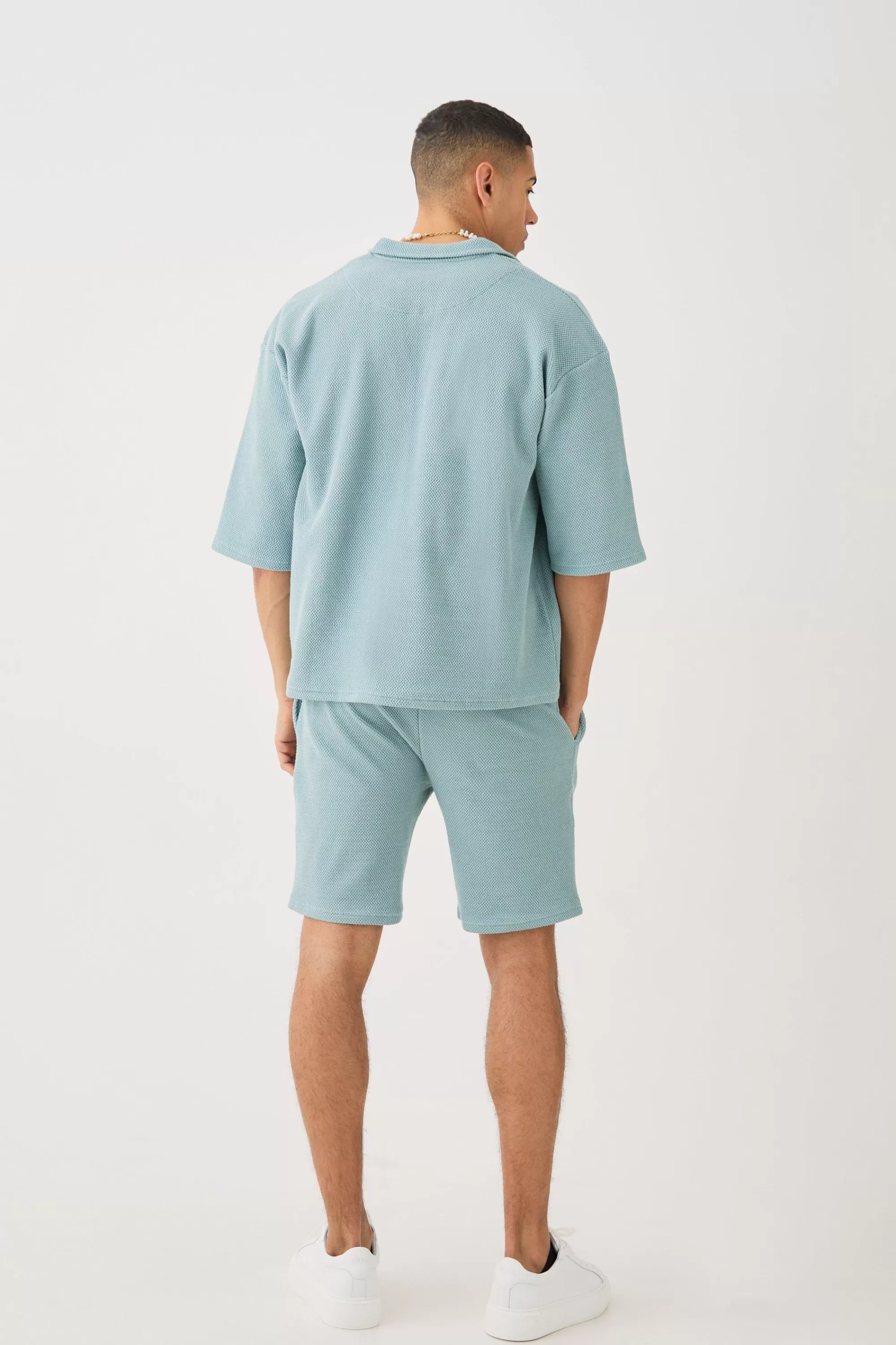 boohooMAN Oversized Boxy Half Sleeve V Neck Polo And Short Set | UK