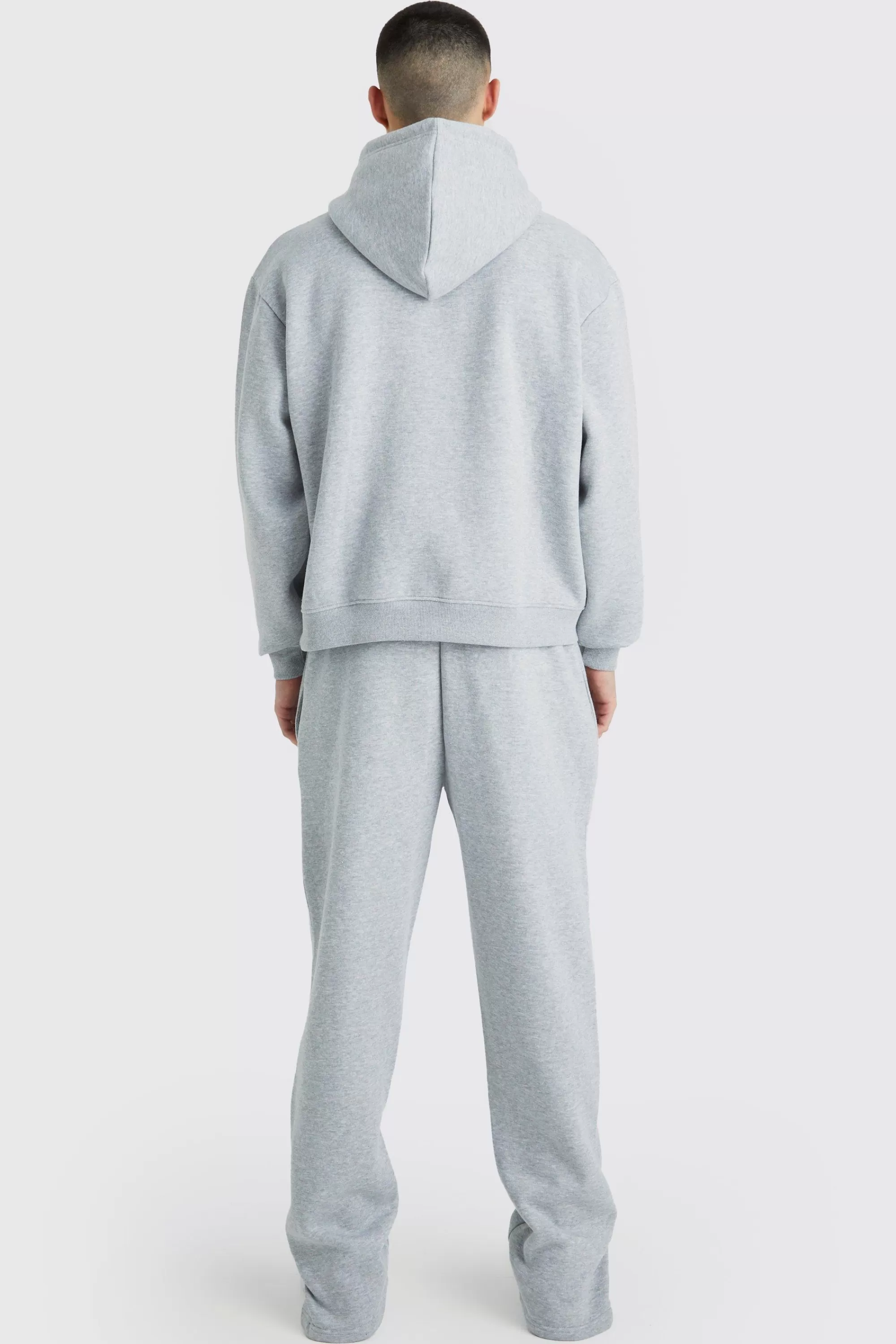 boohooMAN Oversized Boxy Ofcl Spray Split Hem Tracksuit | UK