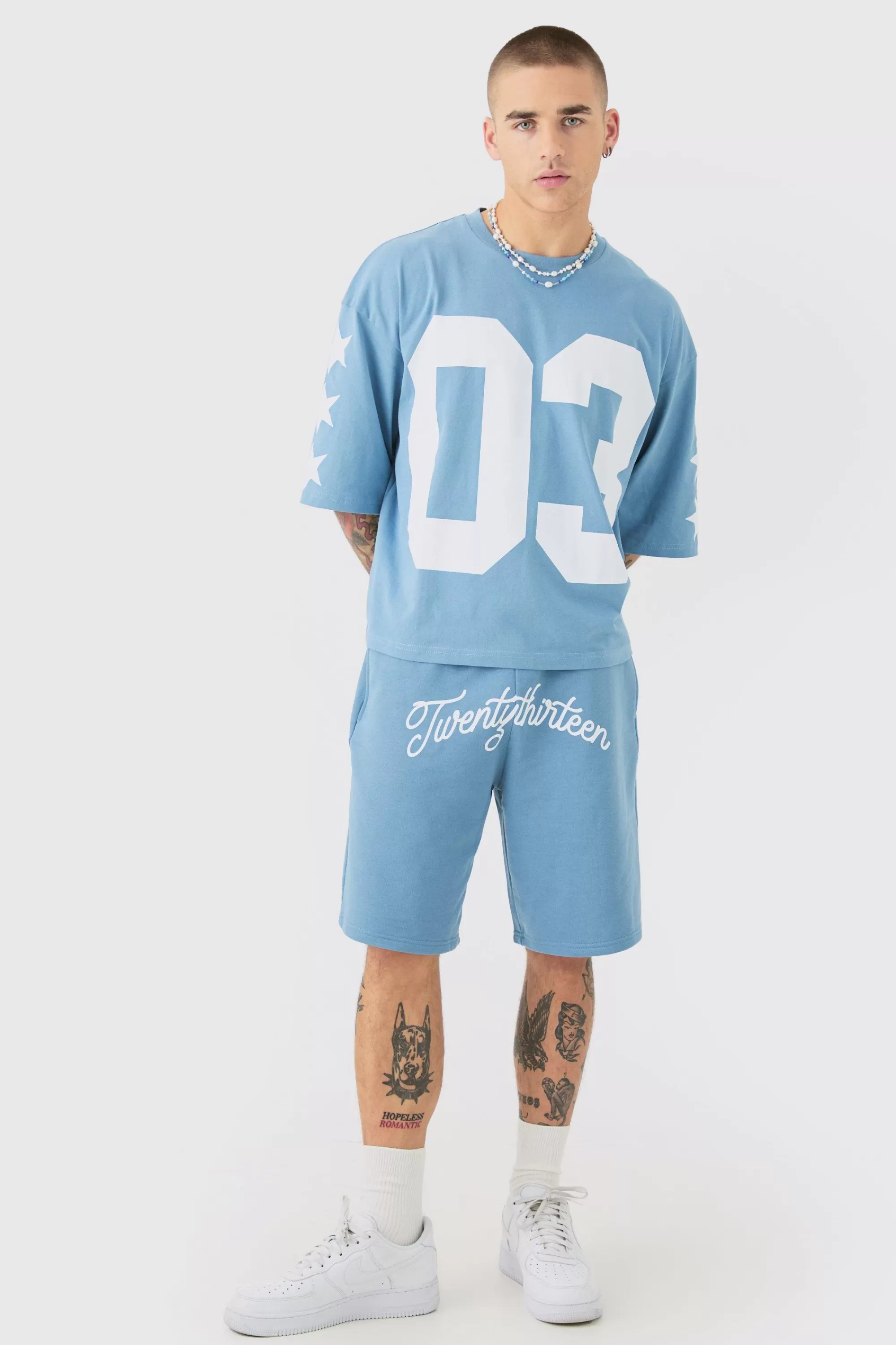 boohooMAN Oversized Boxy Varsity Half Sleeve T-shirt & Short Set | UK
