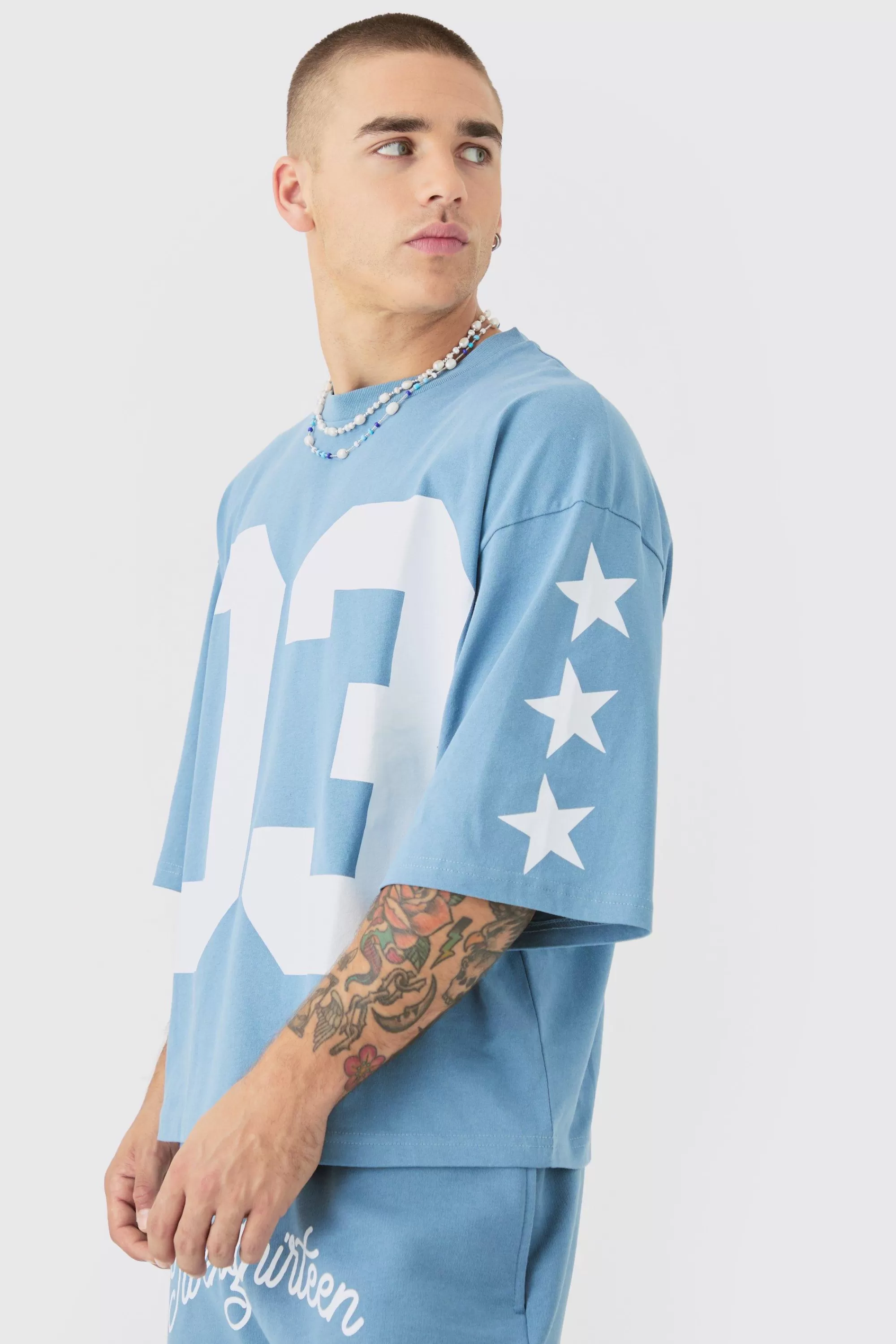 boohooMAN Oversized Boxy Varsity Half Sleeve T-shirt & Short Set | UK