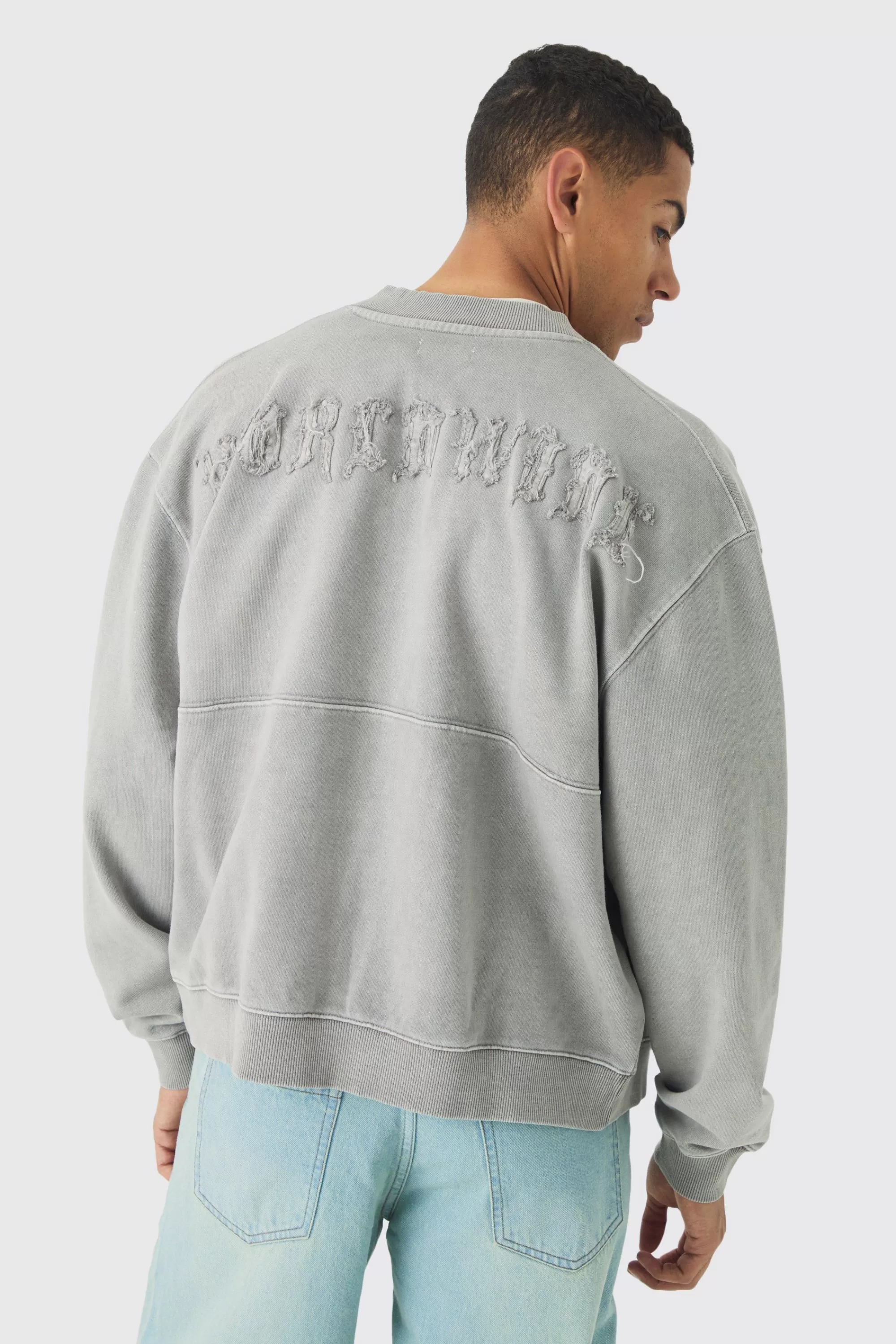 boohooMAN Oversized Boxy Zip Through Distressed Applique Bomber | UK