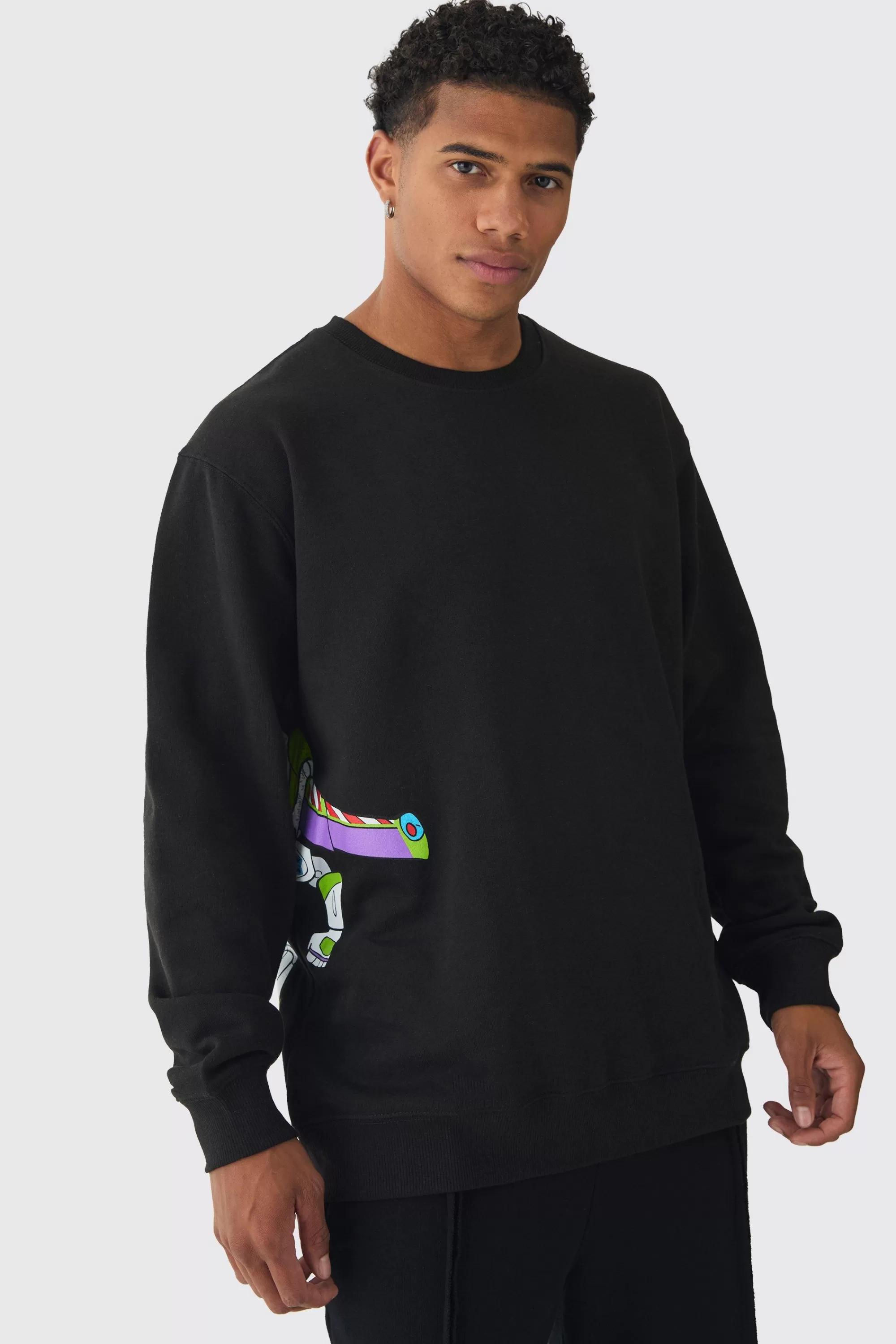 boohooMAN Oversized Buzz Lightyear Toy Story License Print Sweatshirt | UK