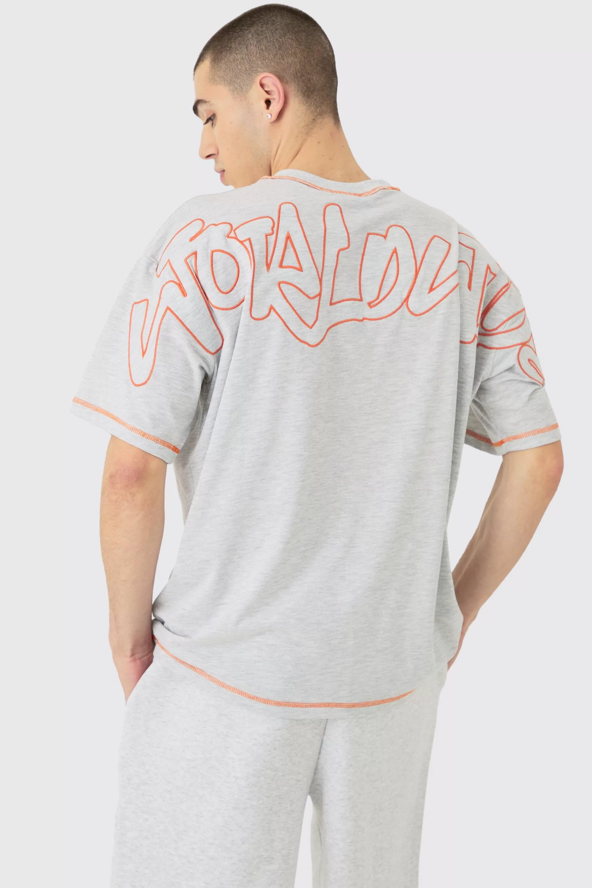 boohooMAN Oversized Contrast Stitch Applique T-shirt & Short Set | UK