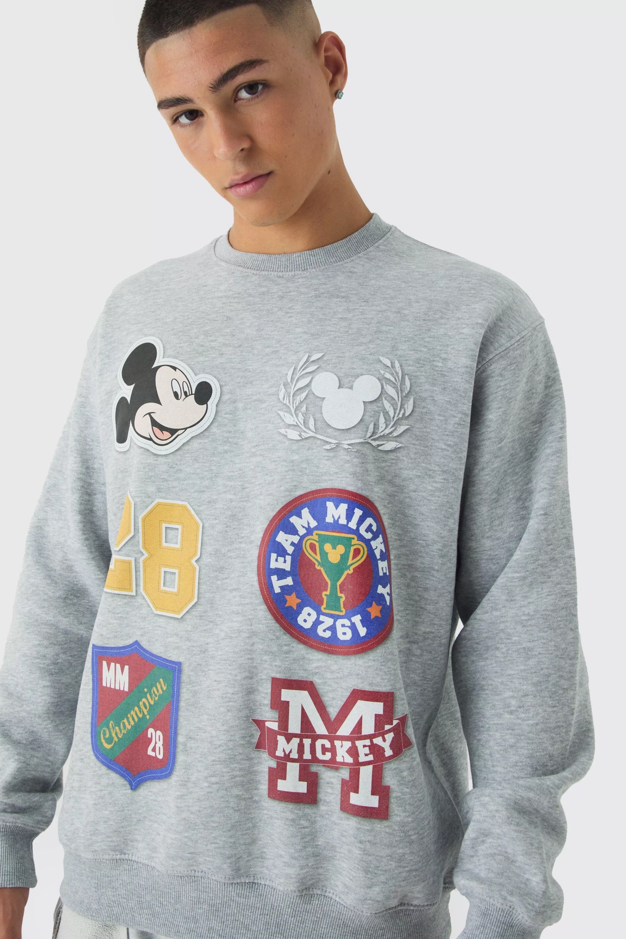 boohooMAN Oversized Disney Mickey Mouse Varsity License Print Sweatshirt | UK