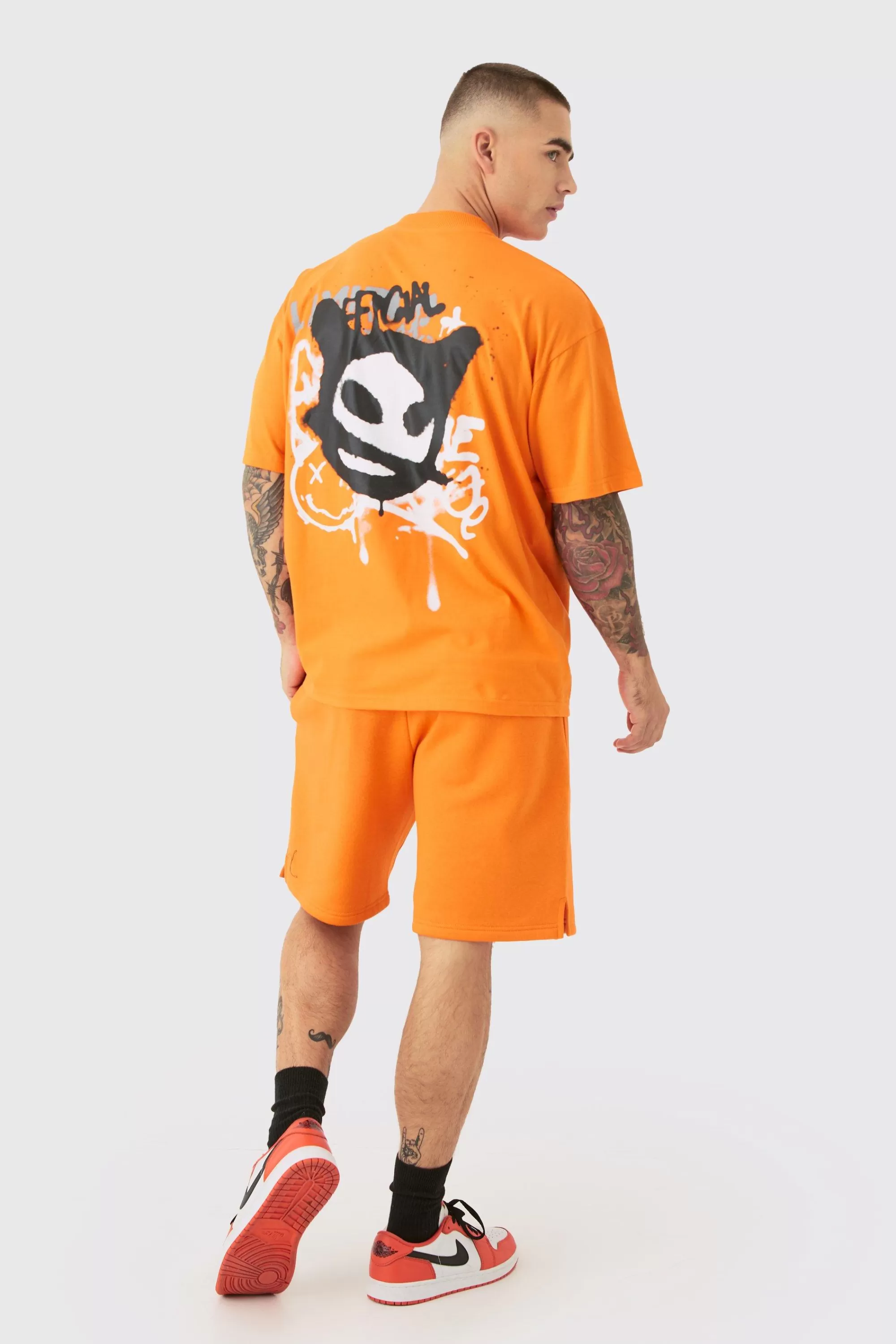 boohooMAN Oversized Extended Neck Graffiti T-shirt And Short Set | UK