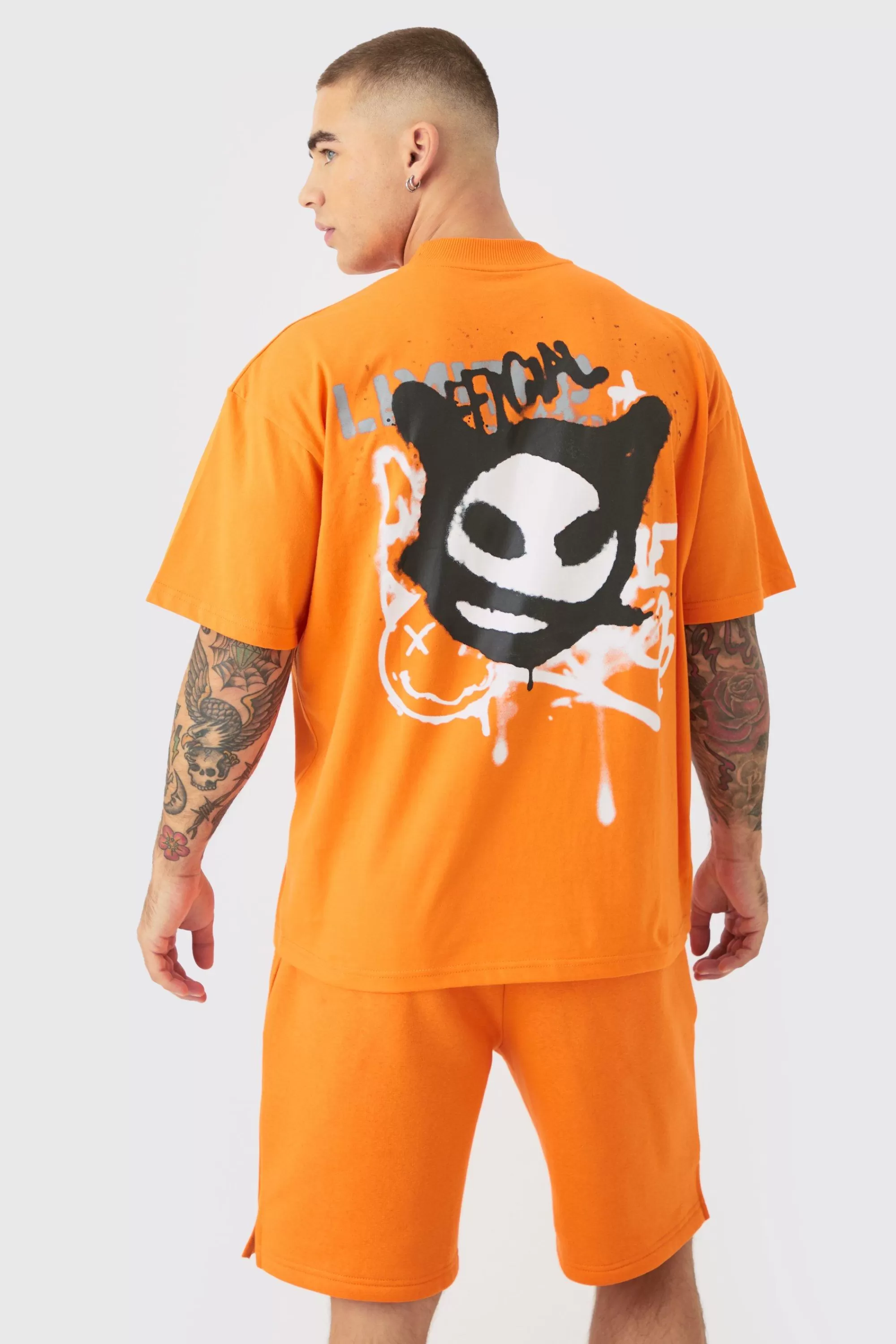 boohooMAN Oversized Extended Neck Graffiti T-shirt And Short Set | UK