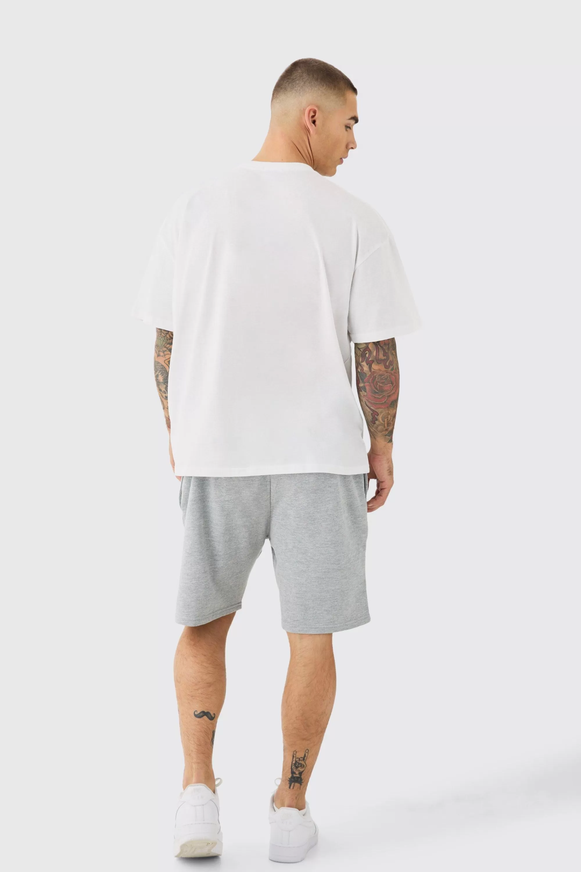boohooMAN Oversized Extended Neck Moon Large Graphic Shorts Set | UK