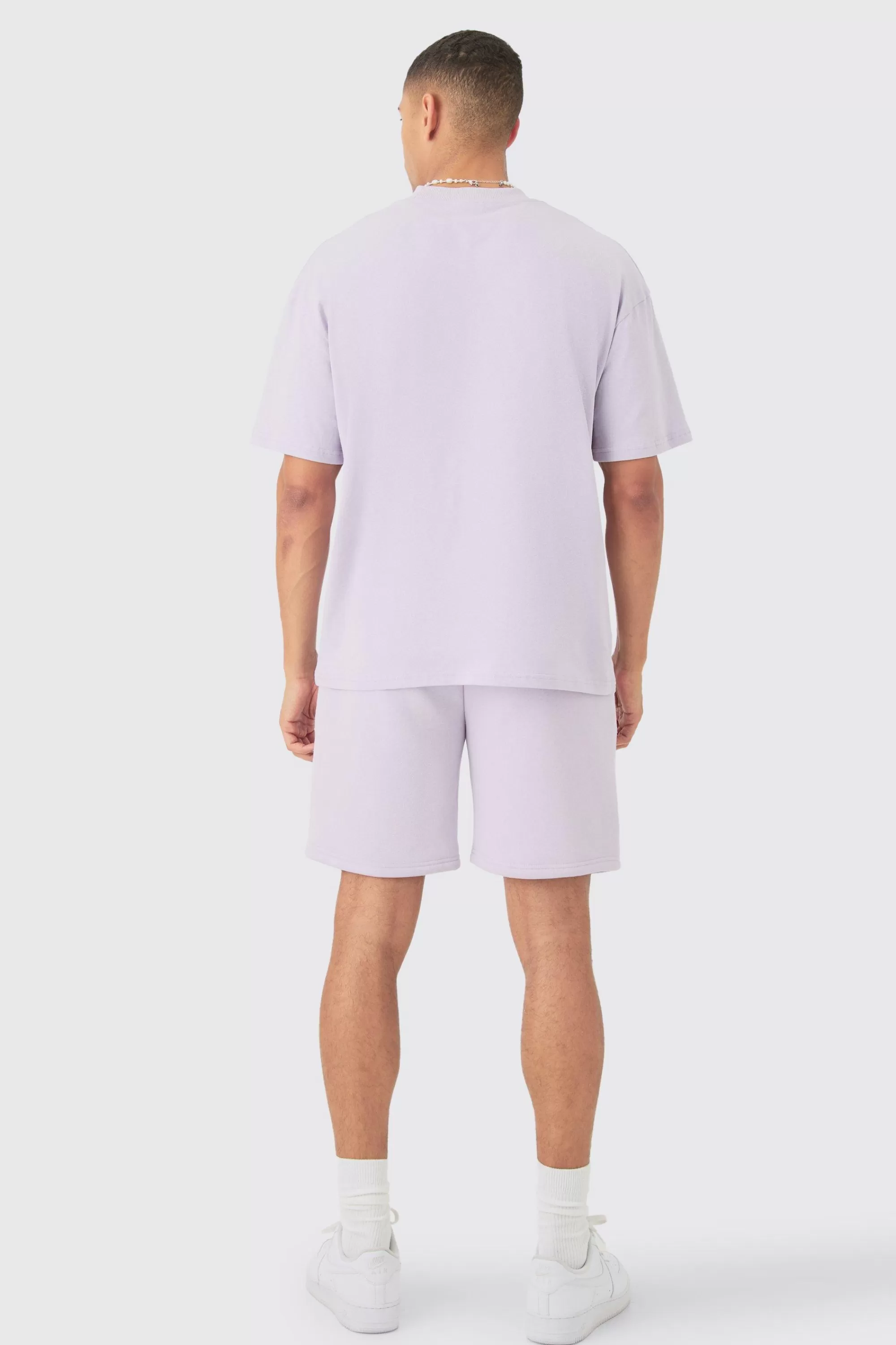 boohooMAN Oversized Extended Neck Official Embossed T-shirt And Relaxed Short Set | UK
