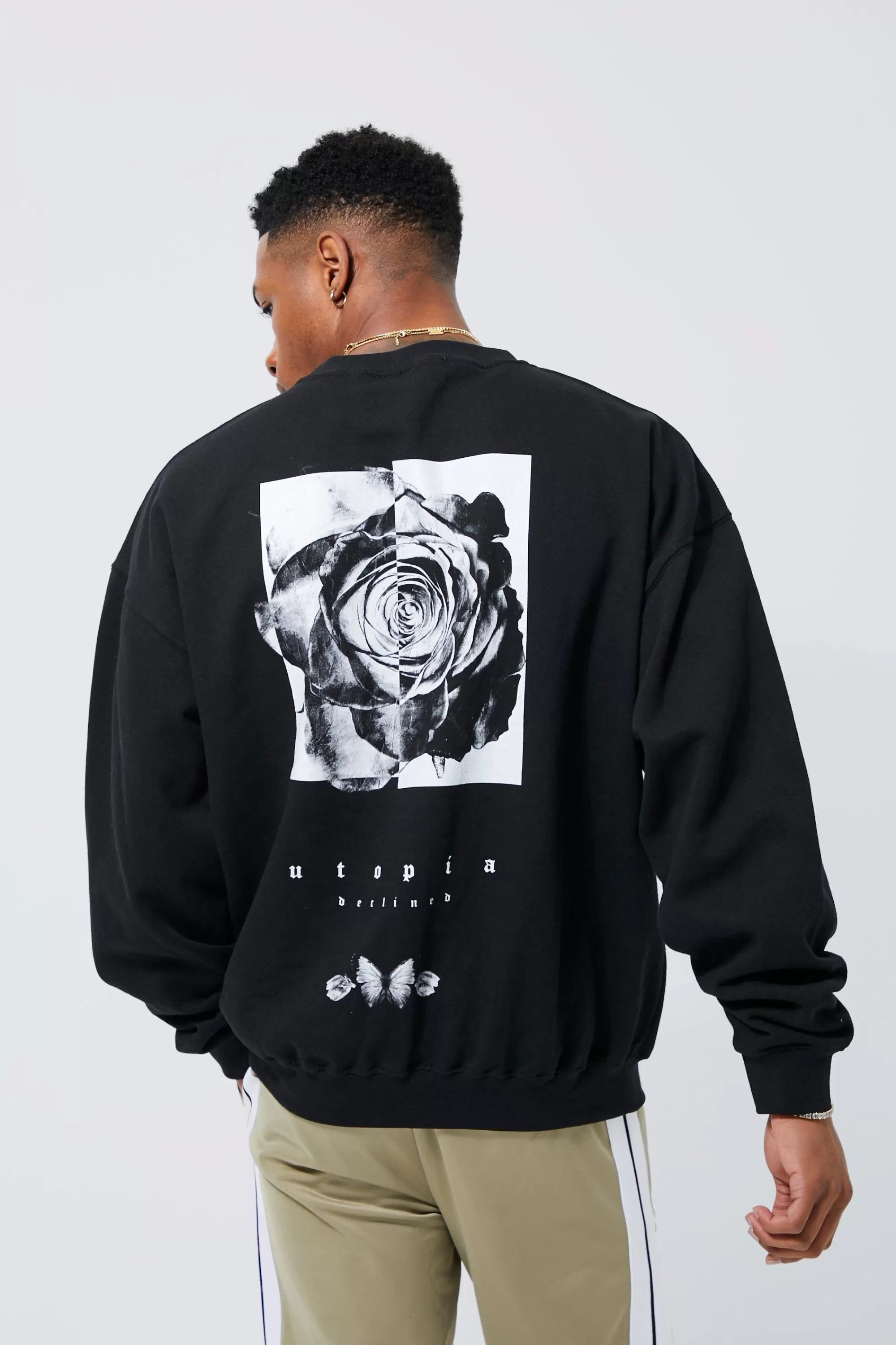boohooMAN Oversized Floral Back Graphic Sweatshirt | UK