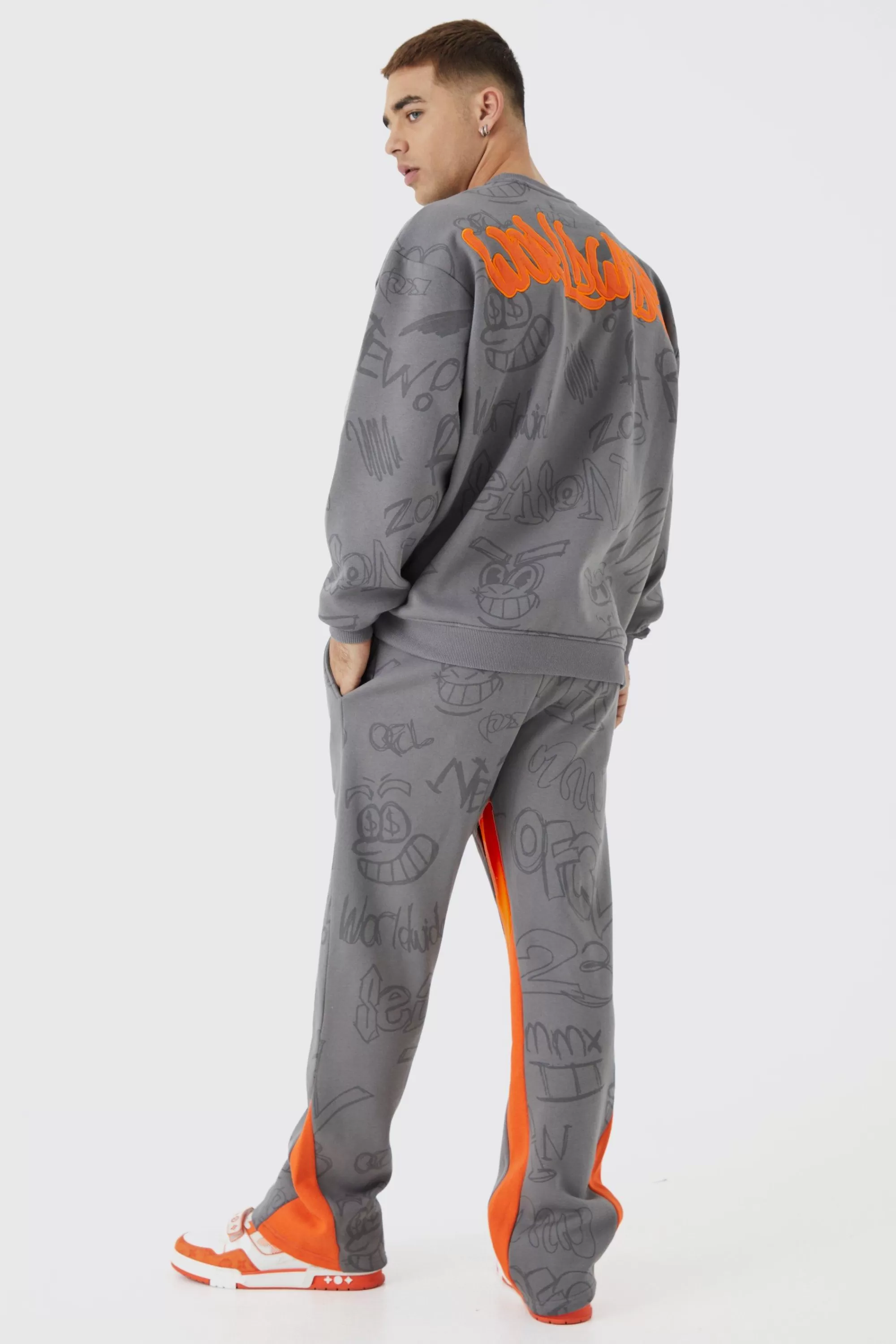 boohooMAN Oversized Graffiti Applique Gusset Tracksuit | UK