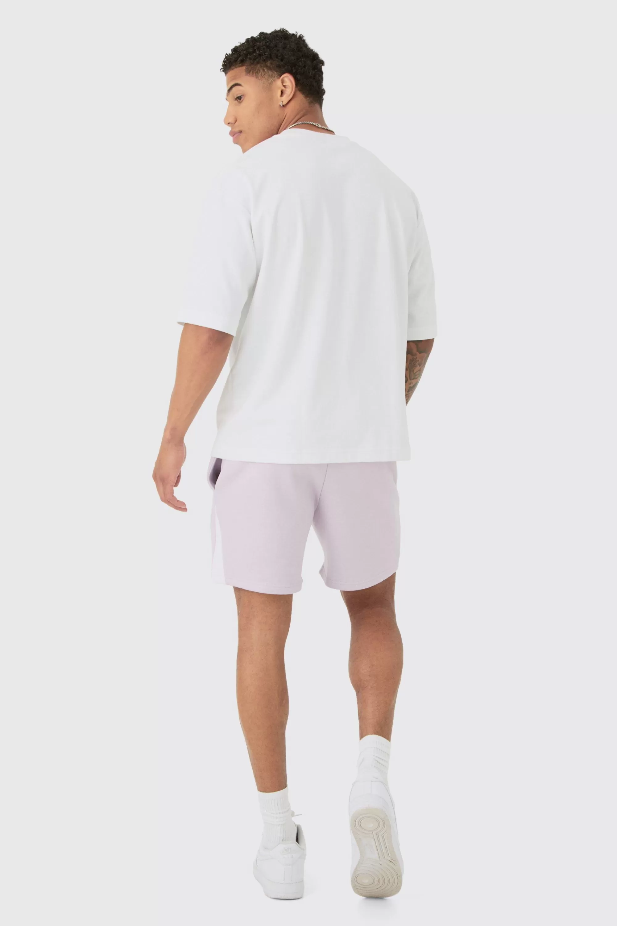 boohooMAN Oversized Graffiti Paint Splatter Shorts | UK