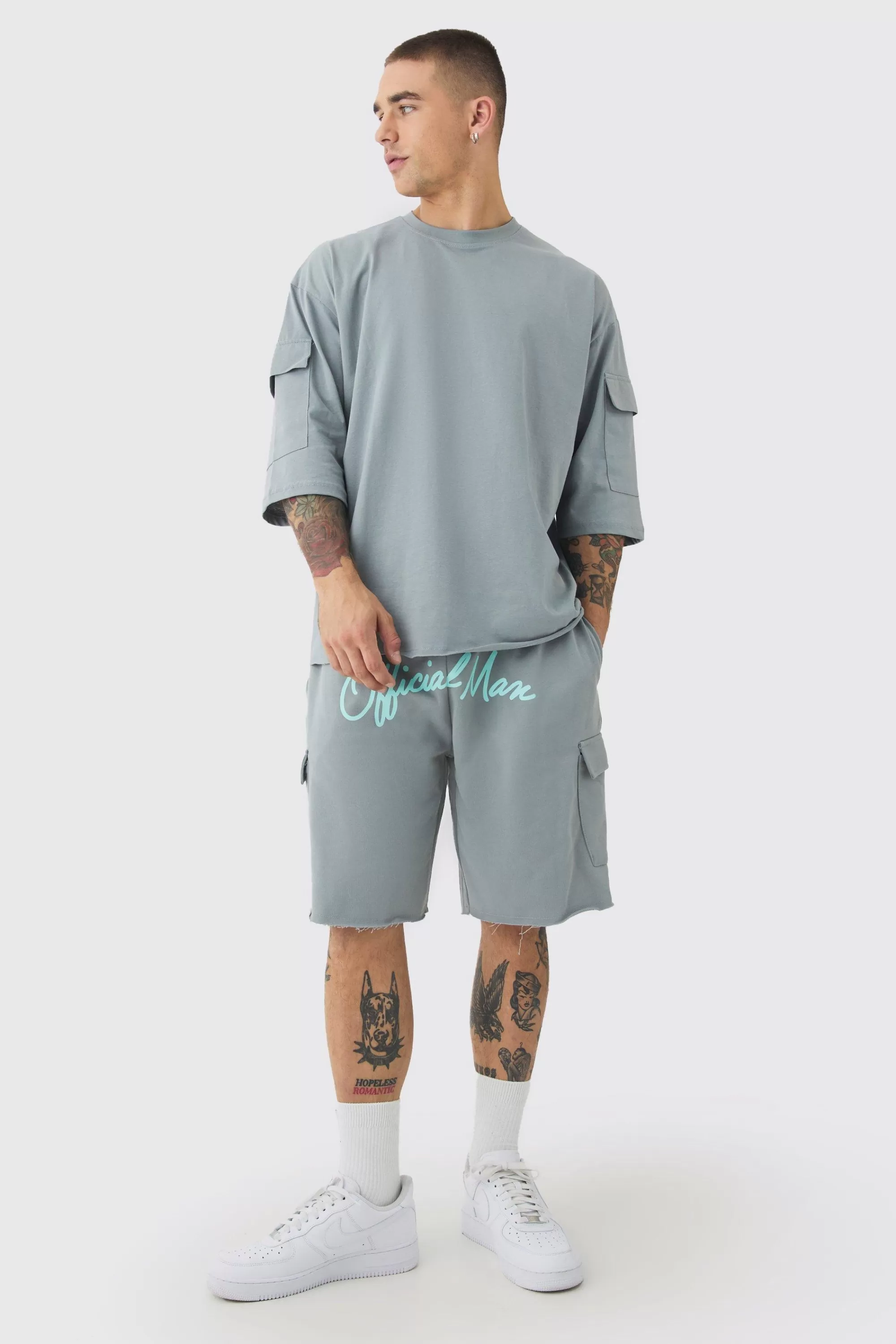 boohooMAN Oversized Half Sleeve Raw Hem Cargo T-shirt & Short Set | UK