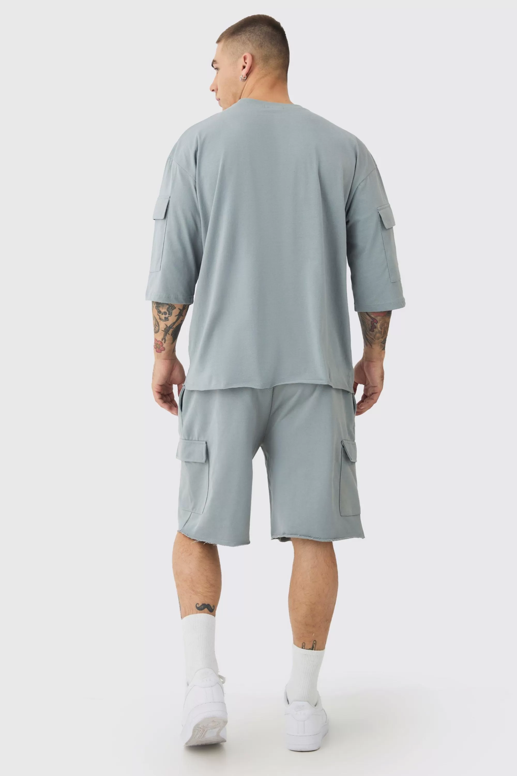 boohooMAN Oversized Half Sleeve Raw Hem Cargo T-shirt & Short Set | UK
