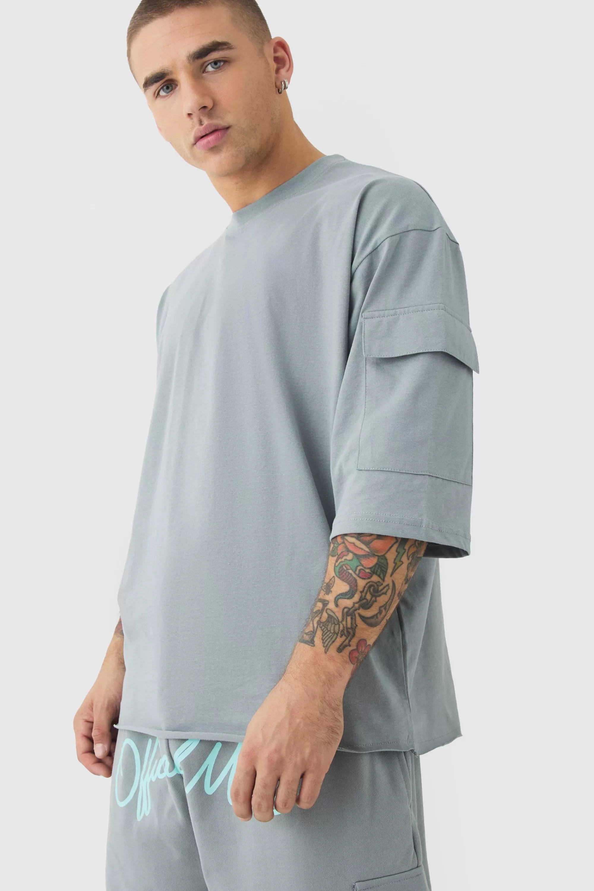 boohooMAN Oversized Half Sleeve Raw Hem Cargo T-shirt & Short Set | UK