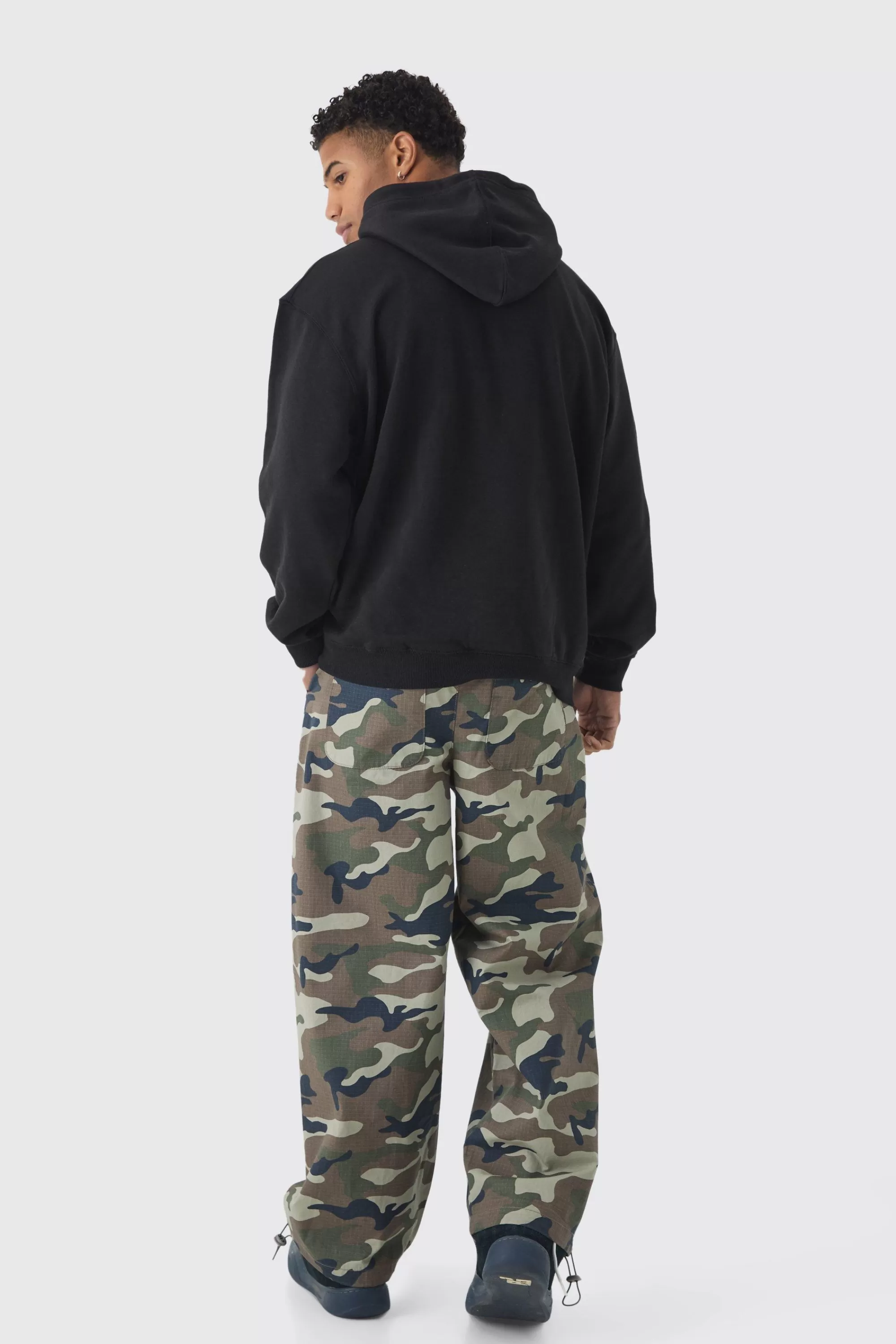 boohooMAN Oversized Homme Star Print Hoodie | UK
