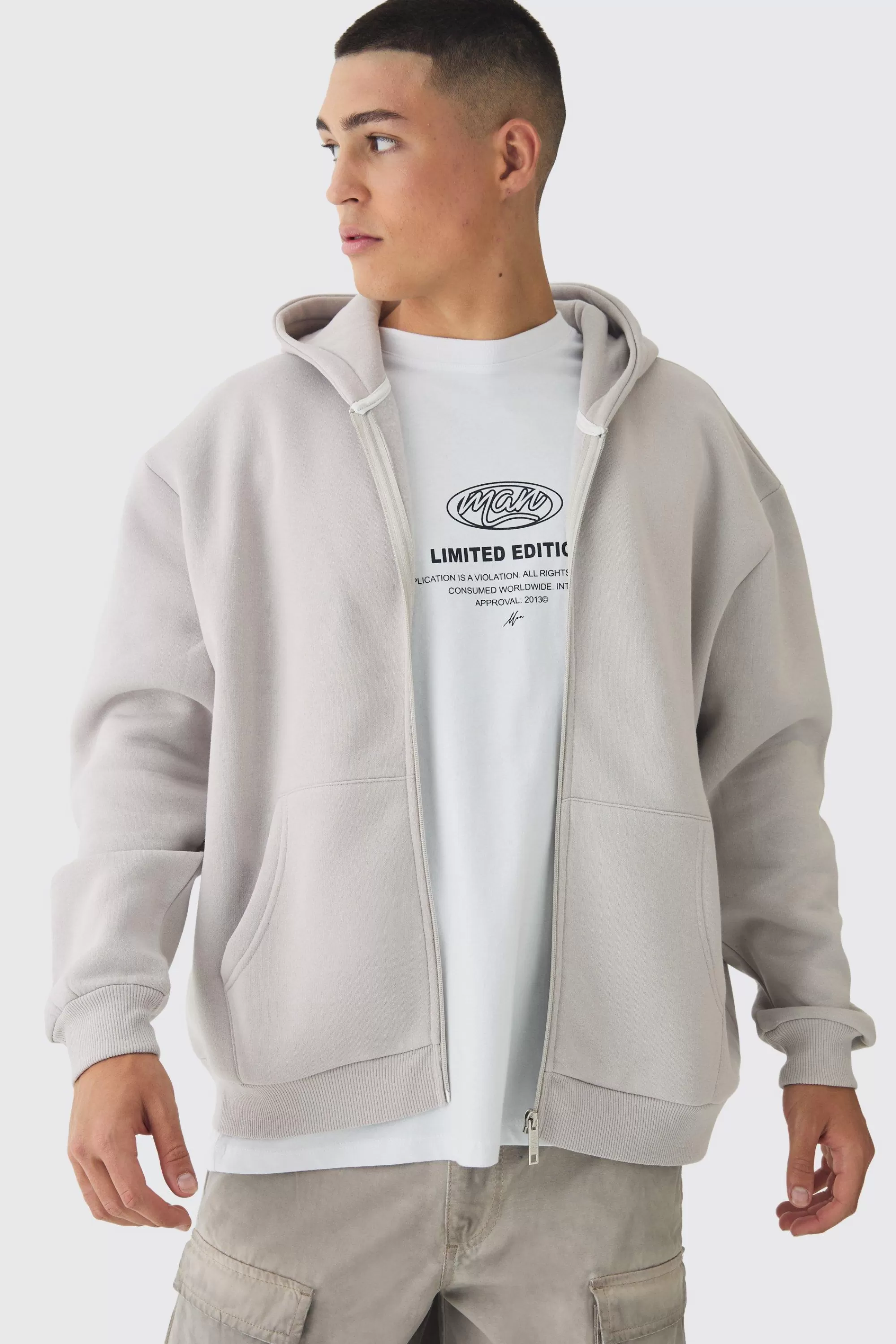 boohooMAN Oversized Official Varsity Embossed Zip Through Hoodie | UK