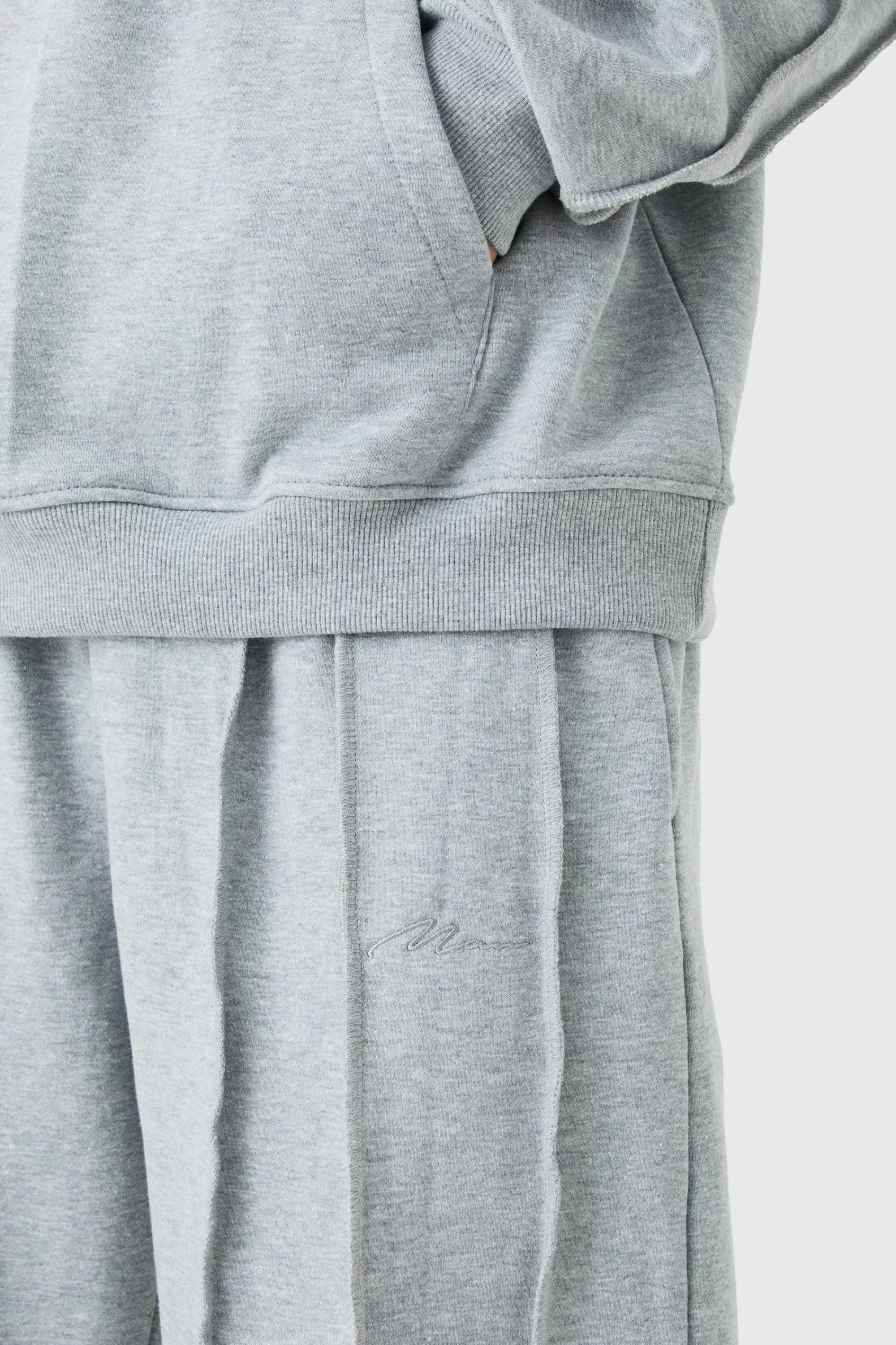 boohooMAN Oversized Raw Seam Man Sig Embroidered Hooded Tracksuit | UK