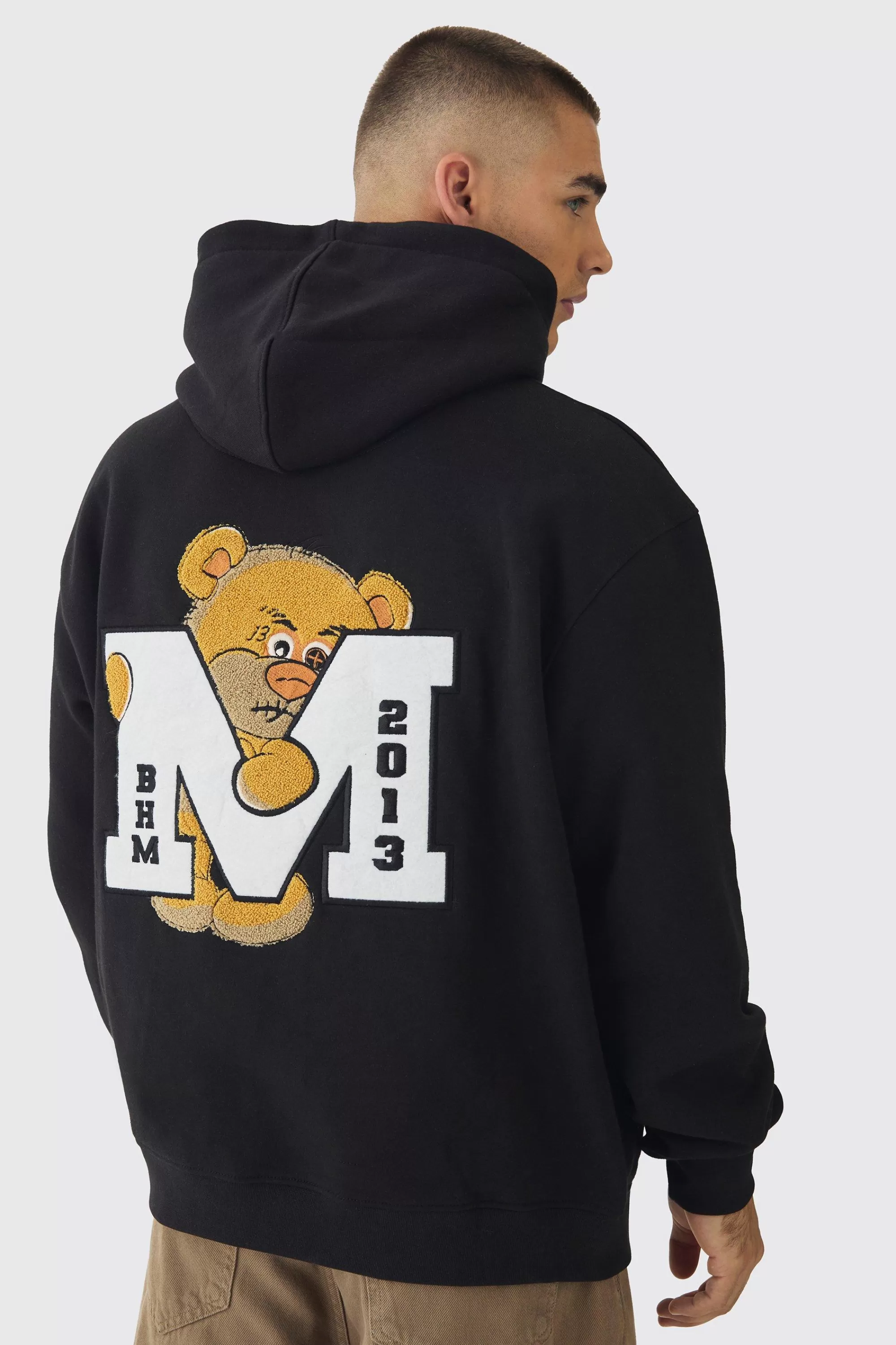 boohooMAN Oversized Varsity Applique Bear Hoodie | UK