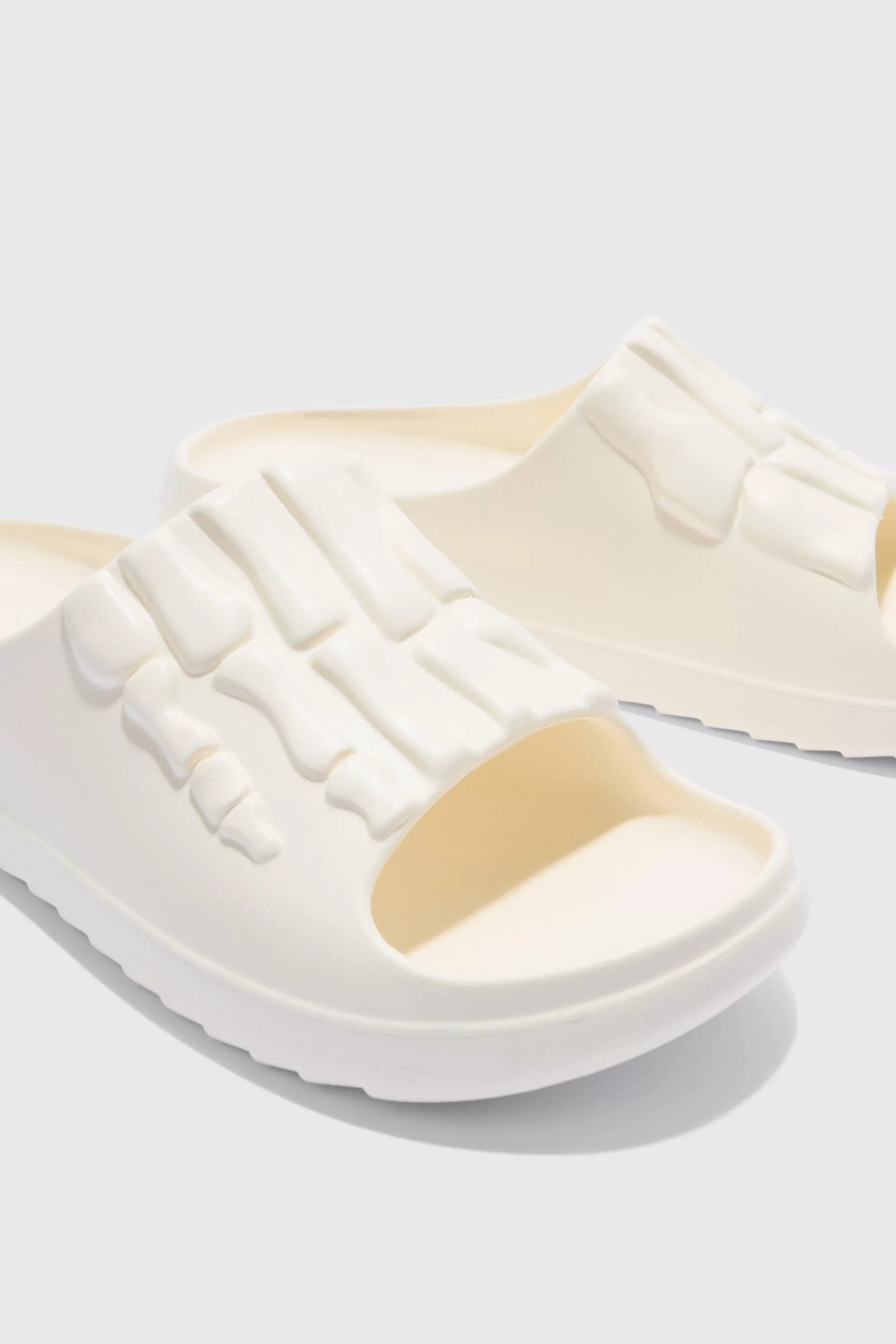 boohooMAN Perforated Skeleton Moulded Slider | UK