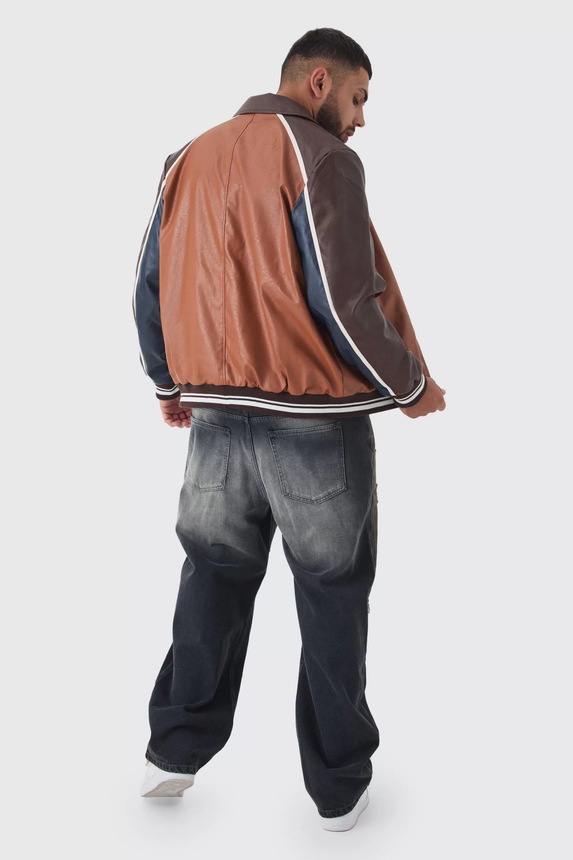 boohooMAN Plus BM Badge Collared PU Varsity Jacket In | UK