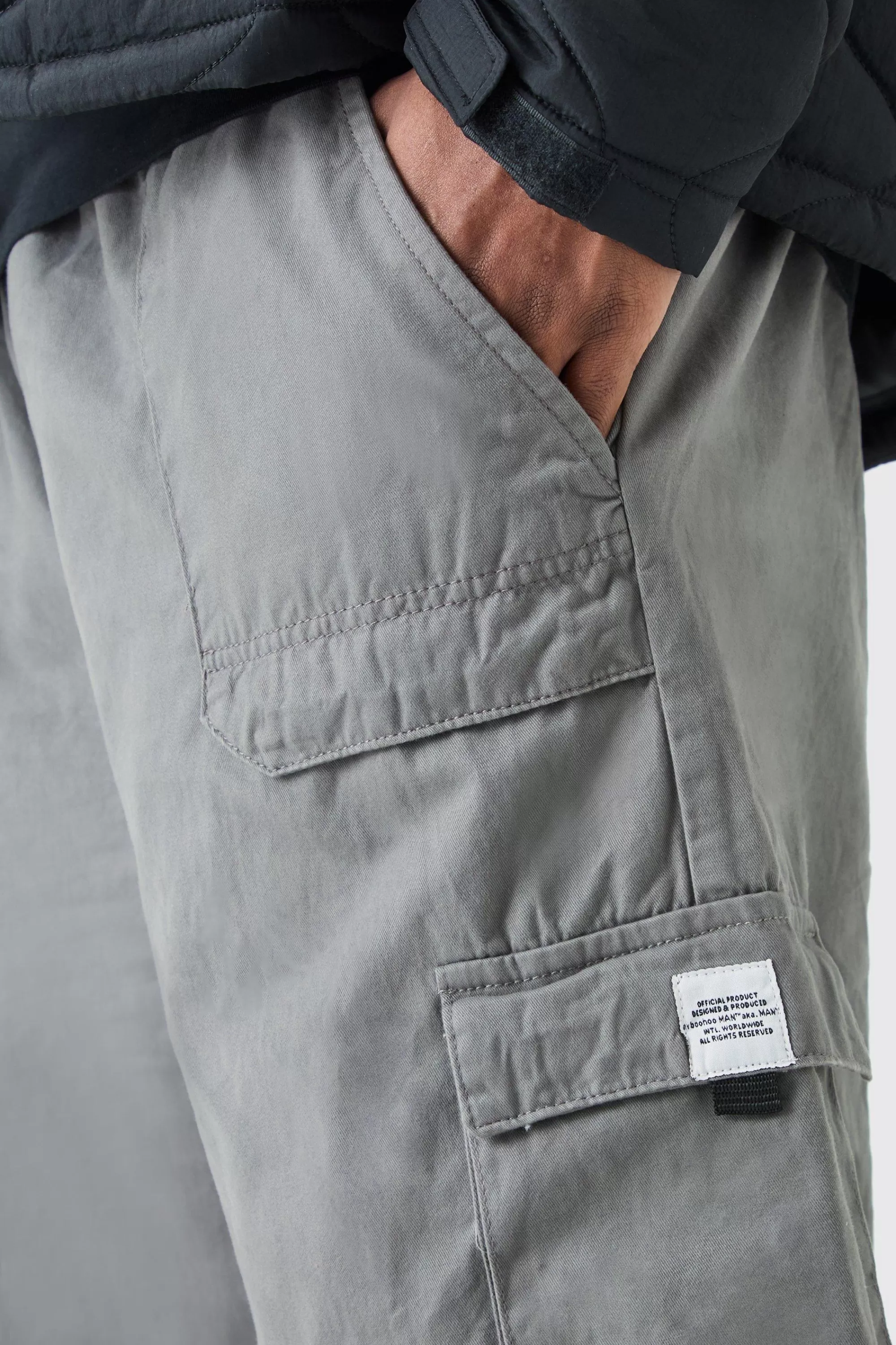 boohooMAN Plus Elastic Waist Relaxed Fit Buckle Cargo Jogger | UK
