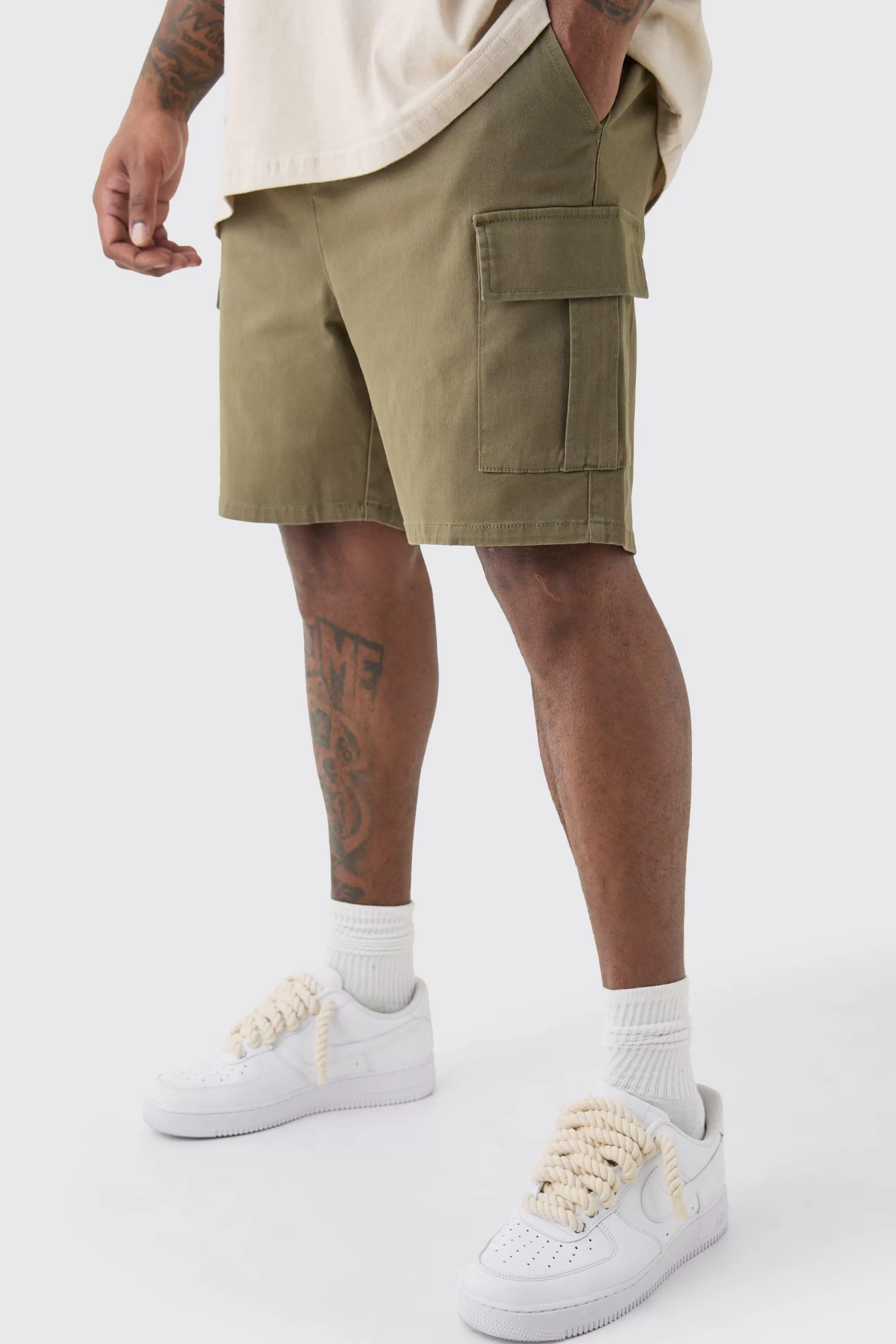 boohooMAN Plus Elasticated Waist Skinny Fit Cargo Shorts | UK