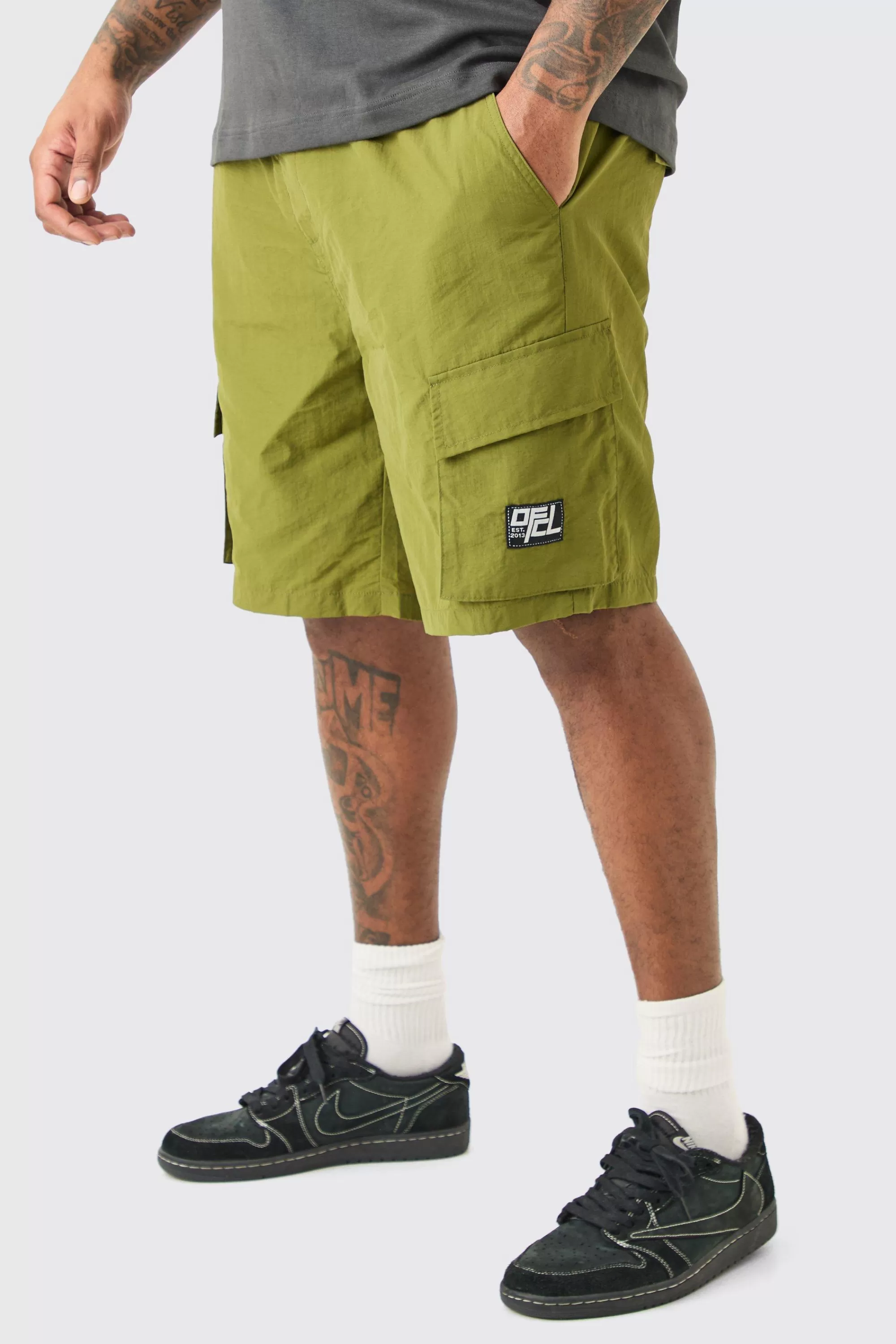 boohooMAN Plus Elasticated Waist Ofcl Nylon Cargo Short | UK