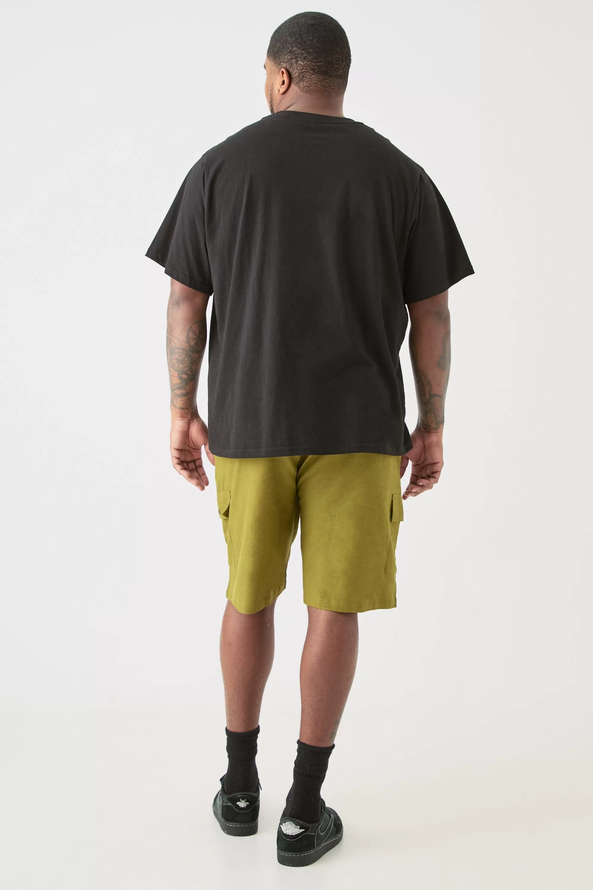 boohooMAN Plus Elasticated Waist Relaxed Linen Cargo Shorts In | UK