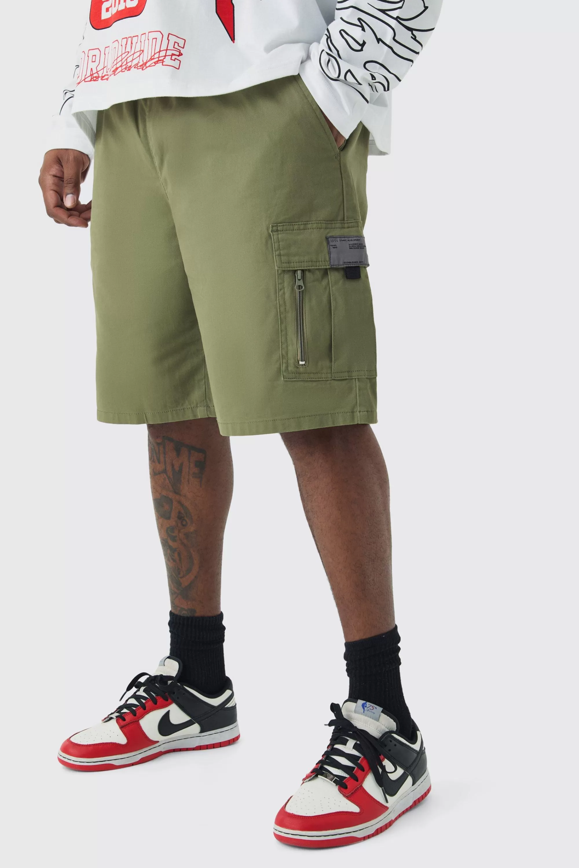boohooMAN Plus Fixed Waist Twill Relaxed Cargo Zip Detail Tab Short | UK