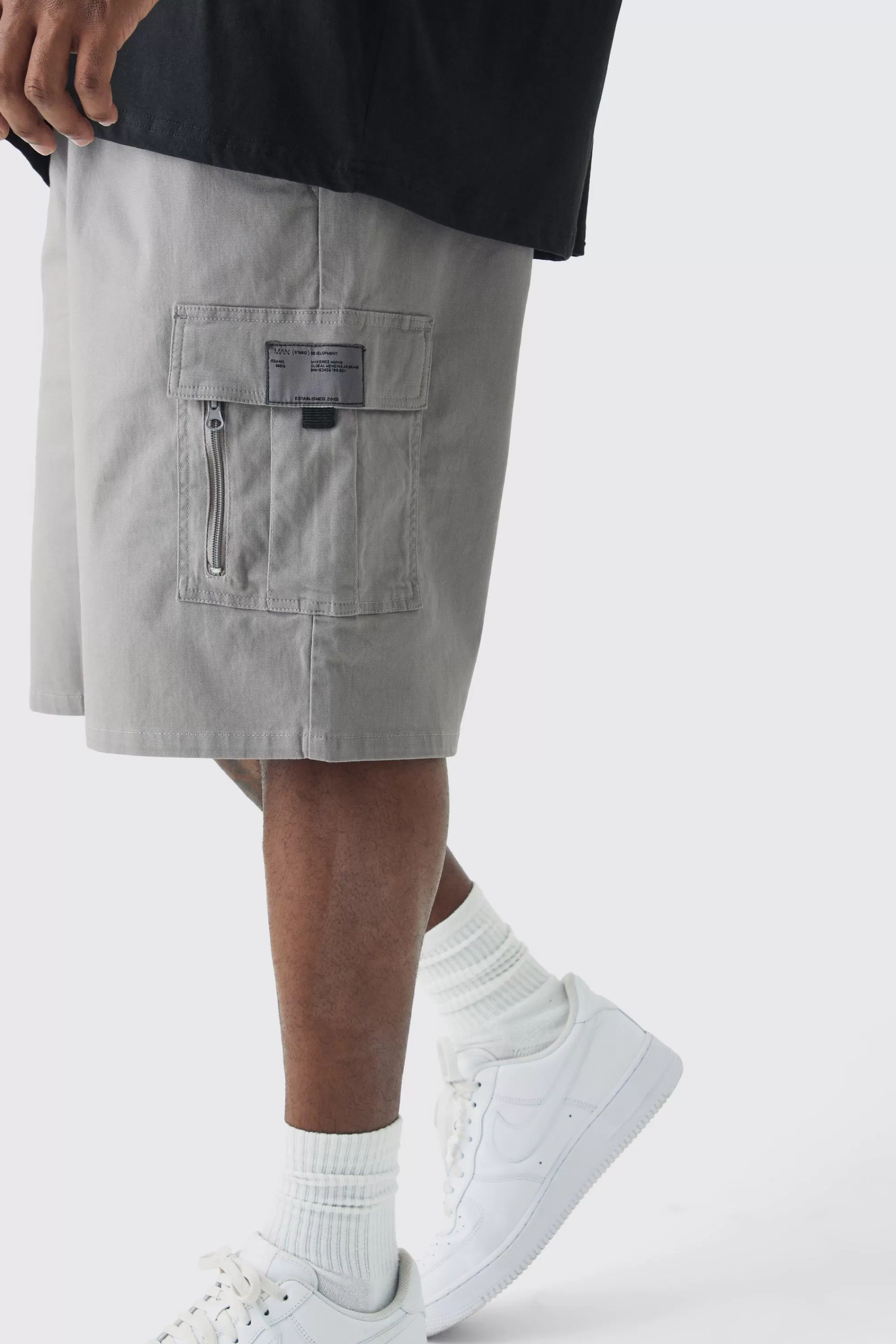 boohooMAN Plus Fixed Waist Twill Relaxed Cargo Zip Detail Tab Short | UK