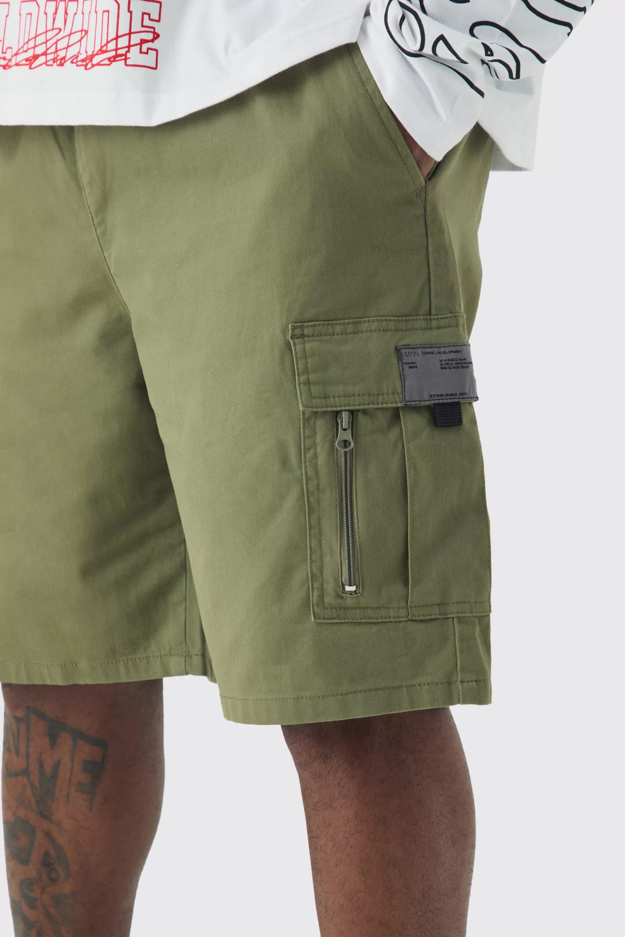 boohooMAN Plus Fixed Waist Twill Relaxed Cargo Zip Detail Tab Short | UK