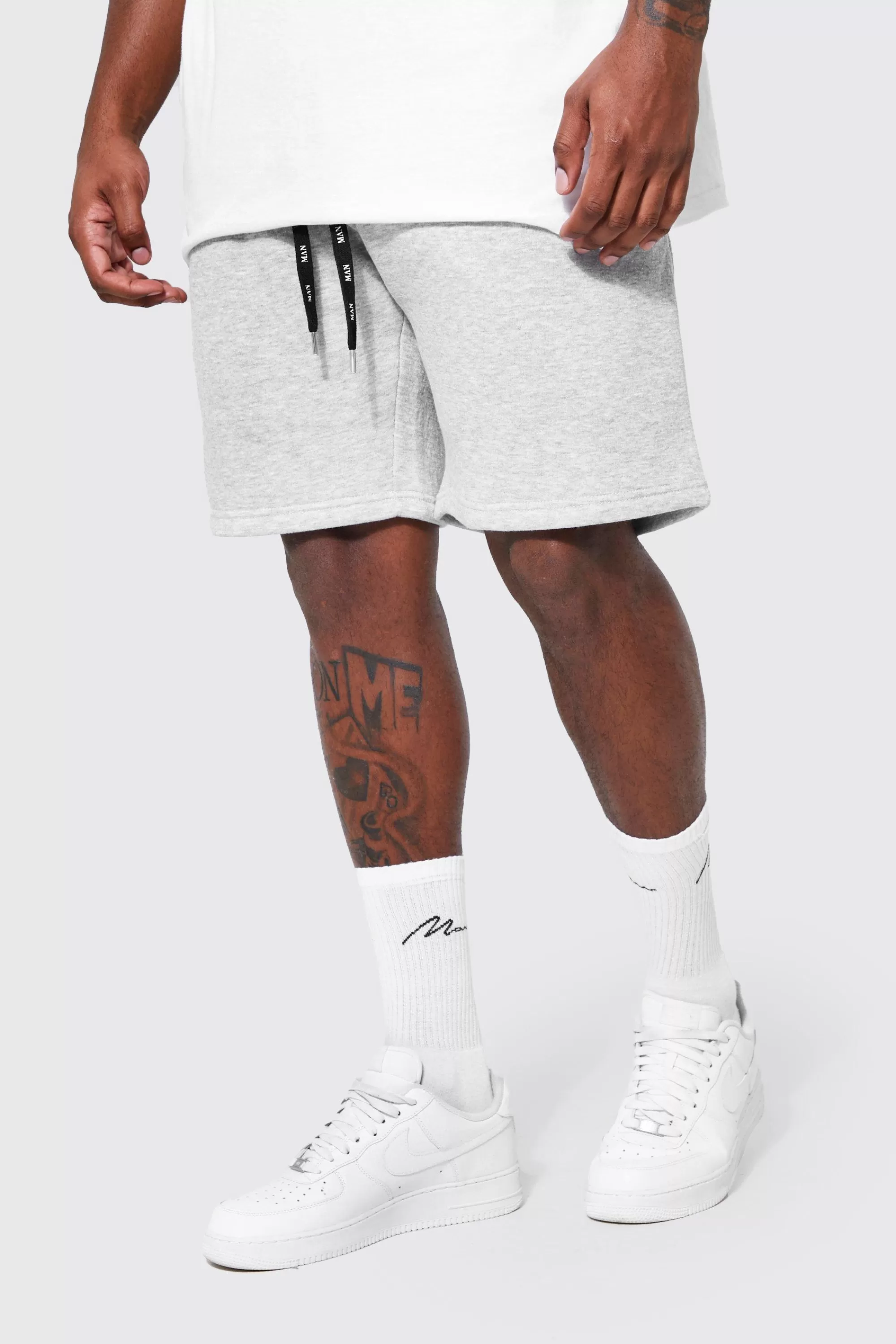 boohooMAN Plus Jersey Shorts With Man Drawcords | UK