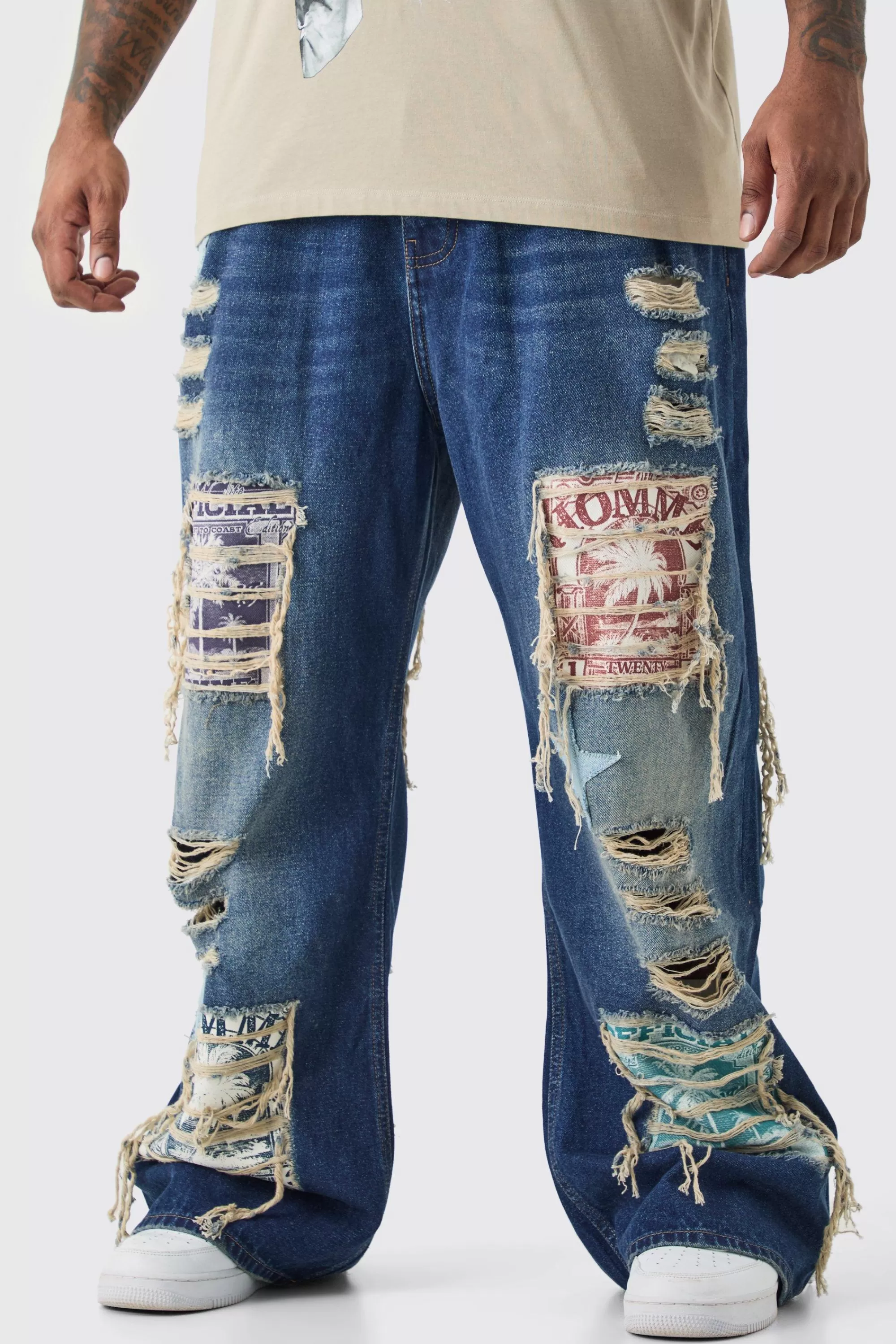 boohooMAN Plus Relaxed Rigid Flare Applique Jeans | UK