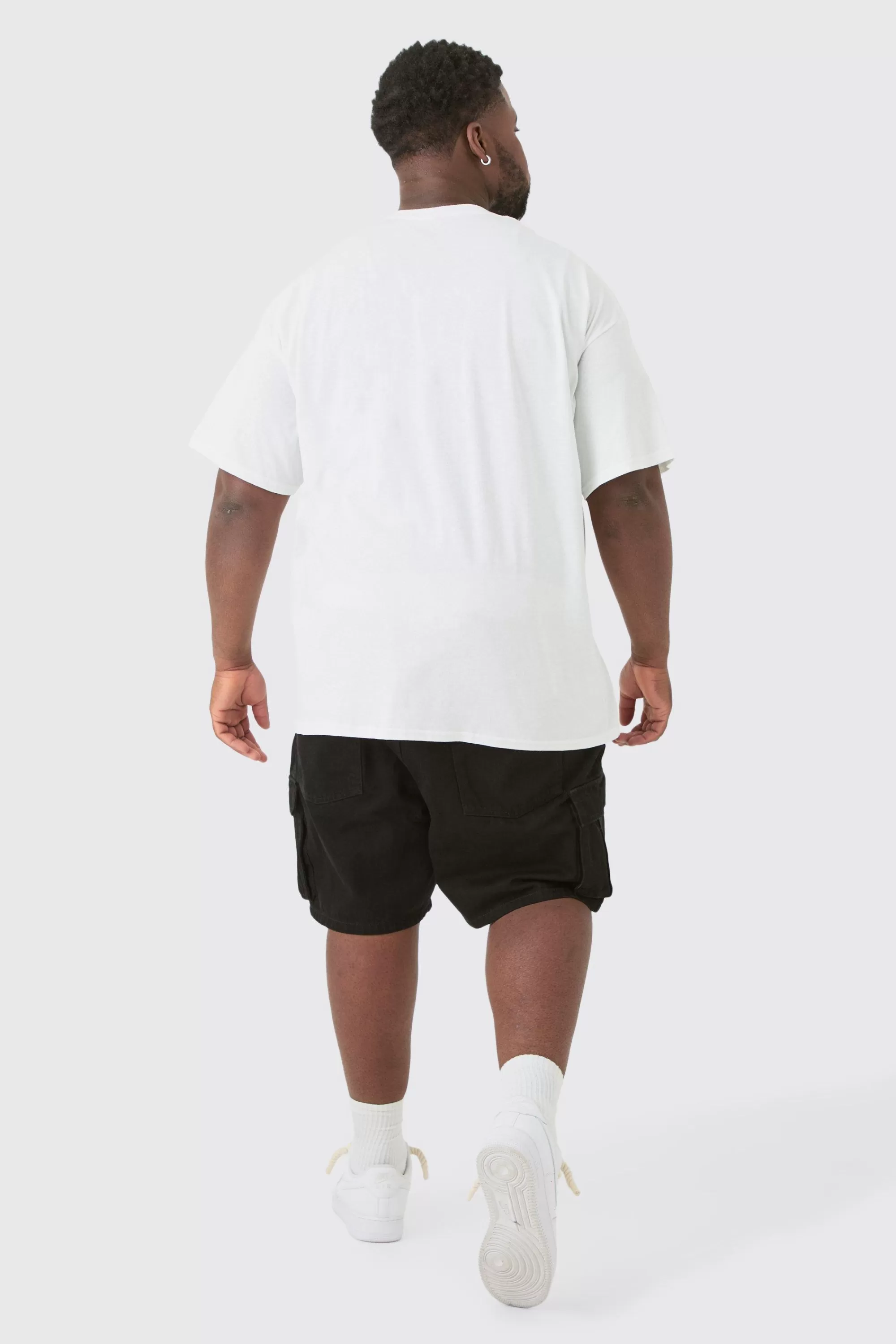 boohooMAN Plus Rigid Denim Relaxed Fit Cargo Shorts In Black | UK