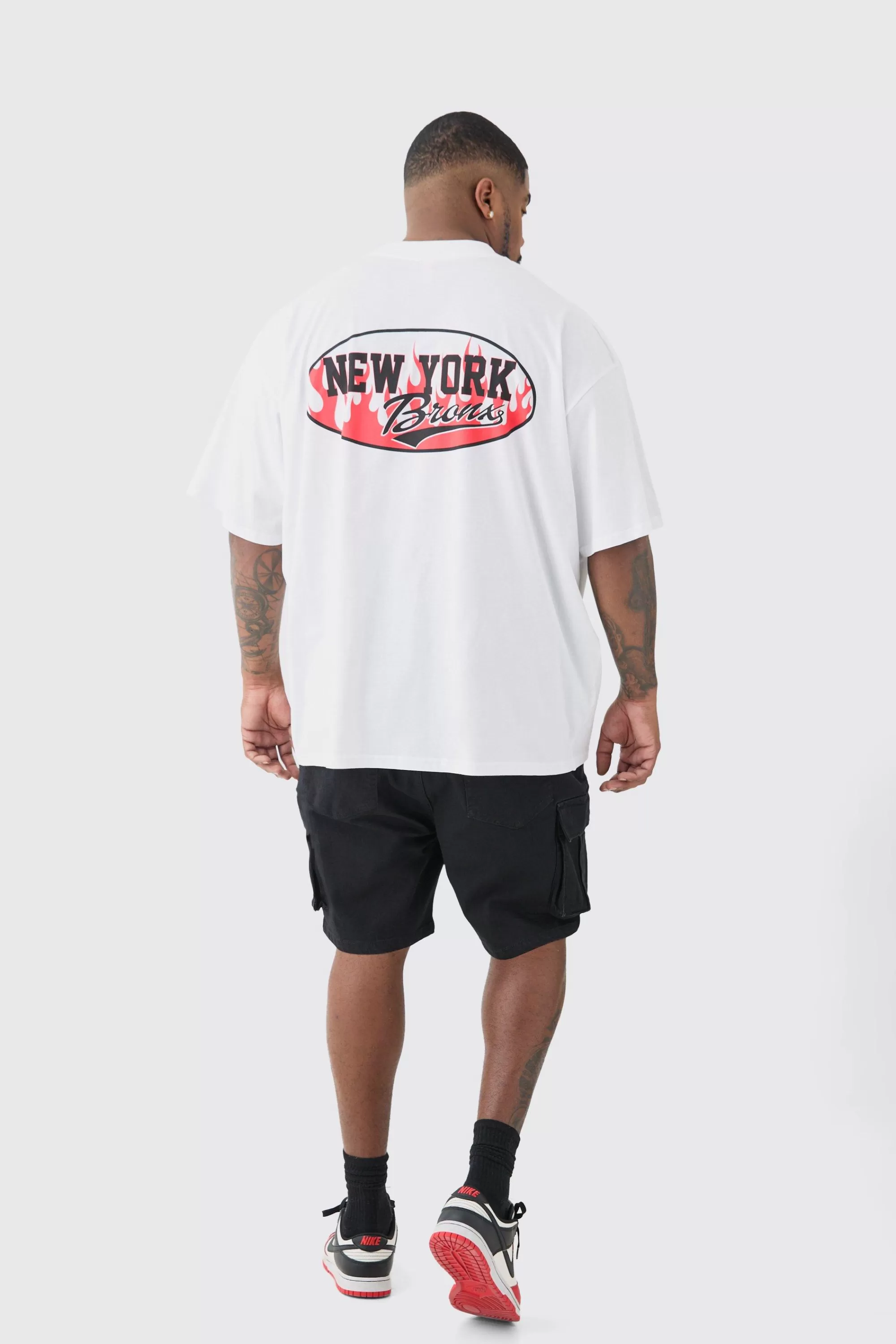 boohooMAN Plus Skinny Stretch Cargo Denim Shorts In Black | UK