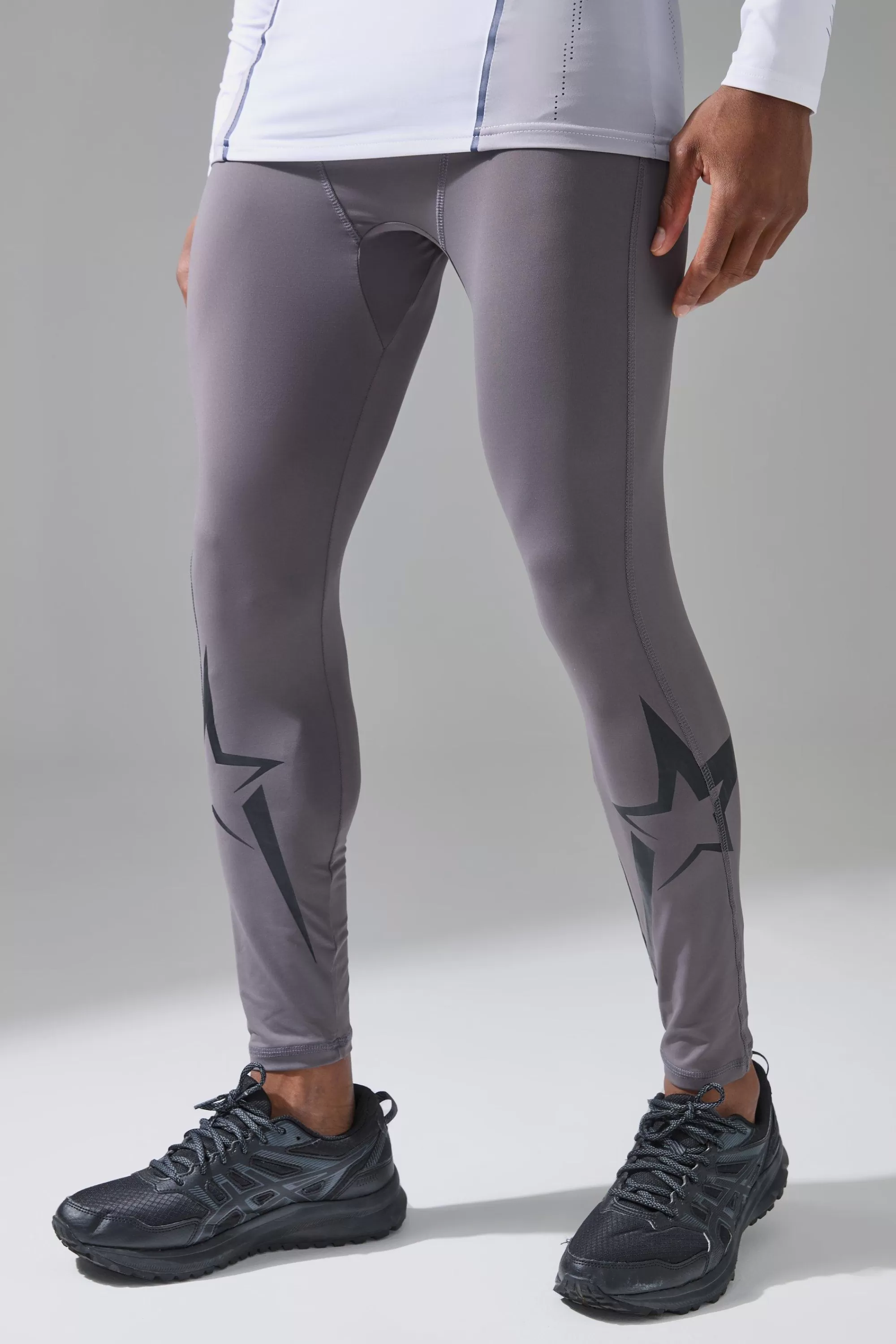 boohooMAN P-Star Active Base Layer Leggings With Star Print | UK