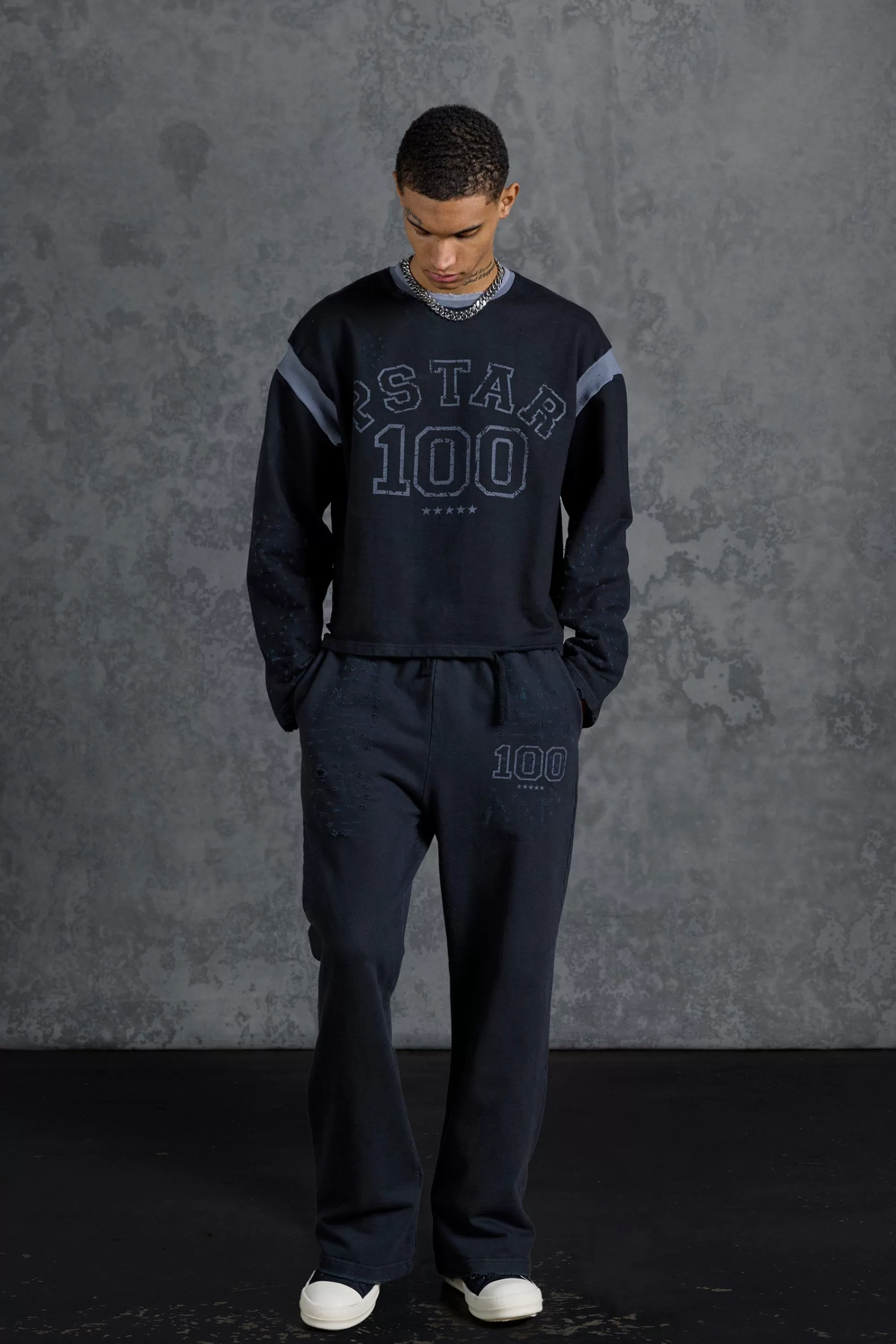 boohooMAN P-Star Slim Fit Flare Joggers With Distressing | UK