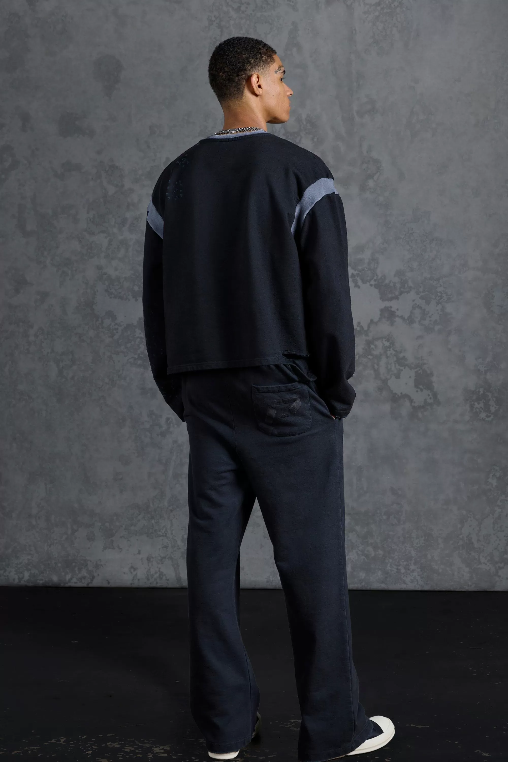 boohooMAN P-Star Slim Fit Flare Joggers With Distressing | UK