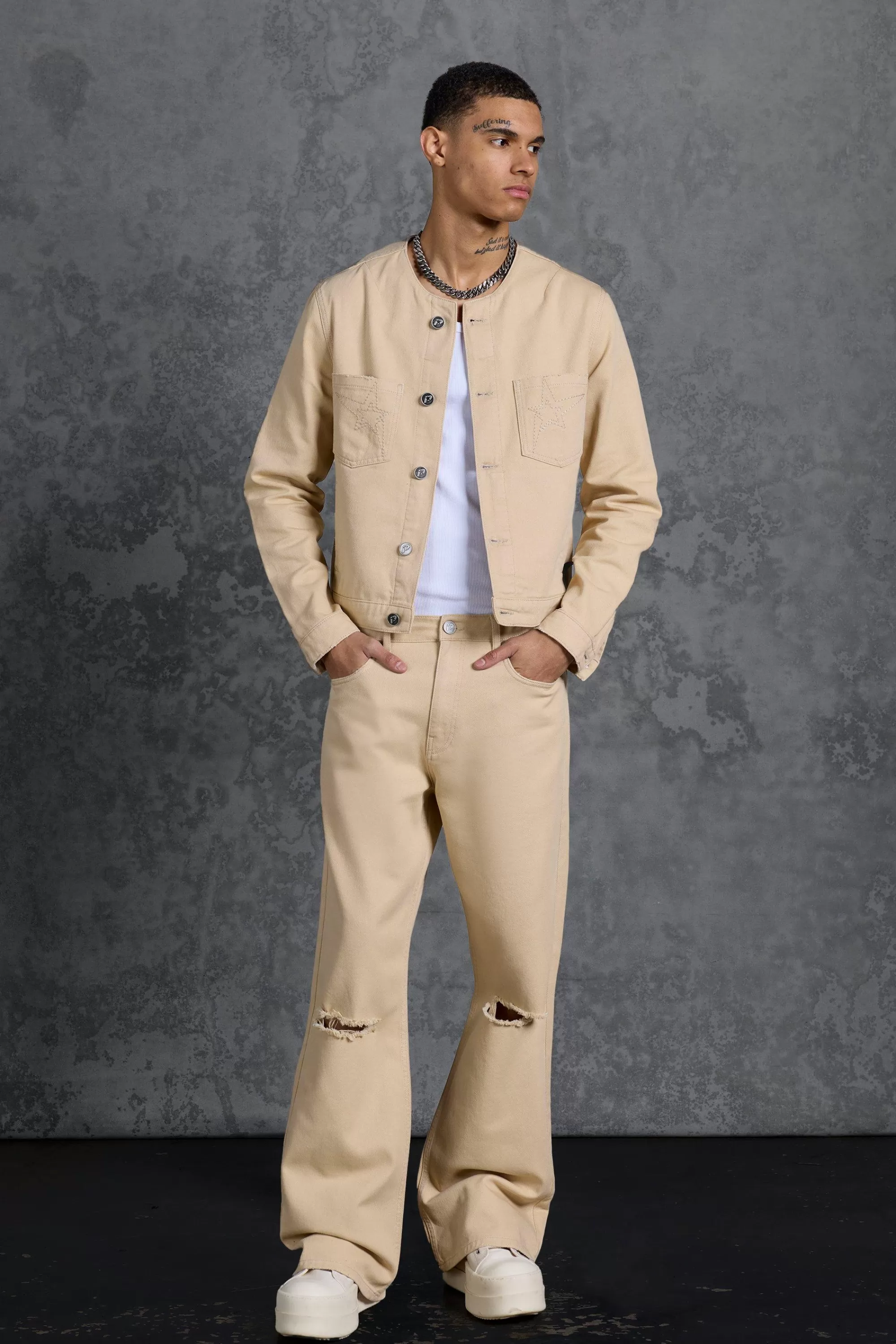 boohooMAN P-Star Slim Fit Flare Stacked Jeans With Ripped Knee | UK