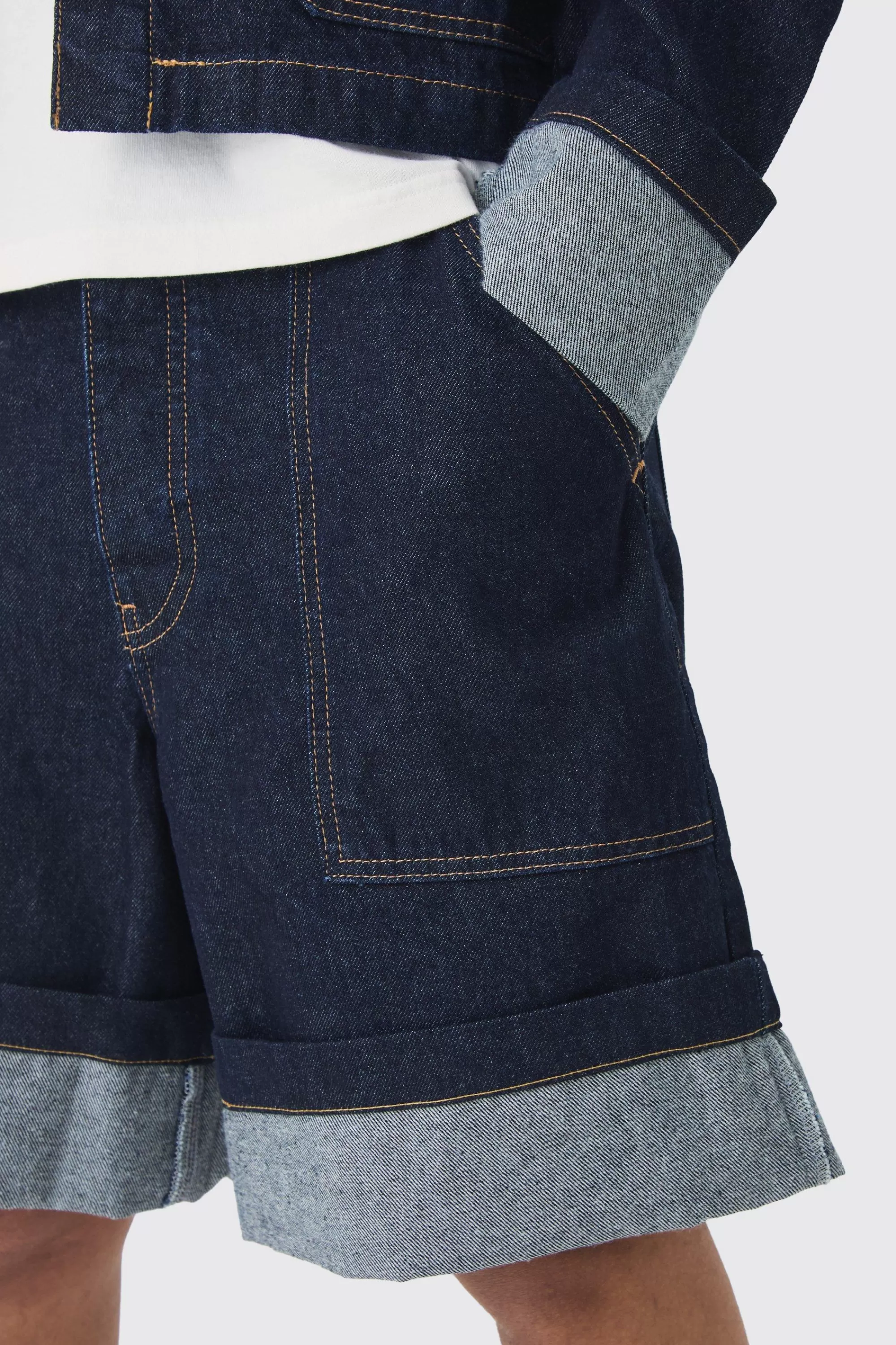 boohooMAN Regular Rigid Denim Turn Up Jorts In | UK